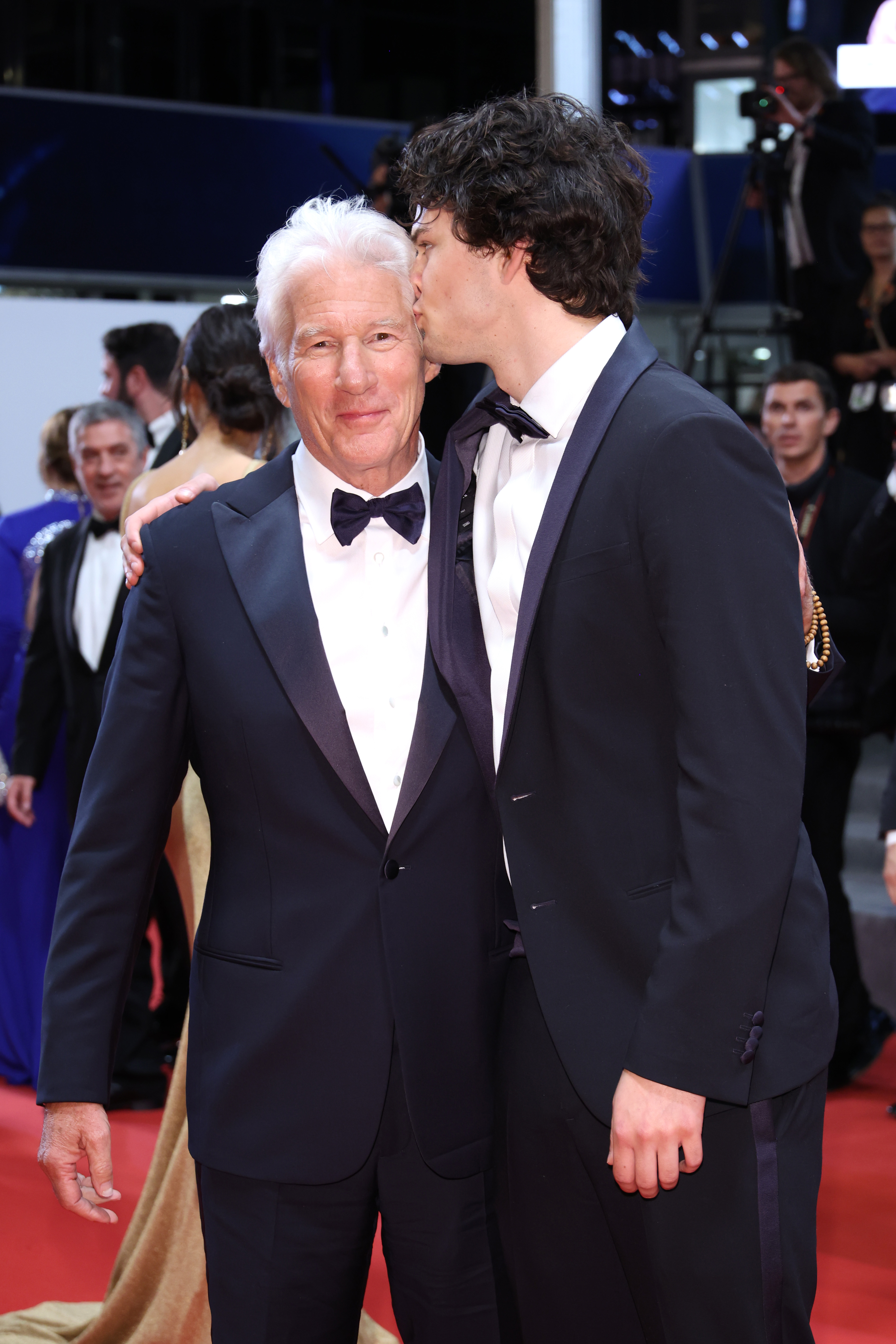 Richard Gere and Homer James Jigme Gere on the "Oh, Canada" red carpet during the 77th annual Cannes Film Festival in Cannes, France on May 17, 2024. | Source: Getty Images