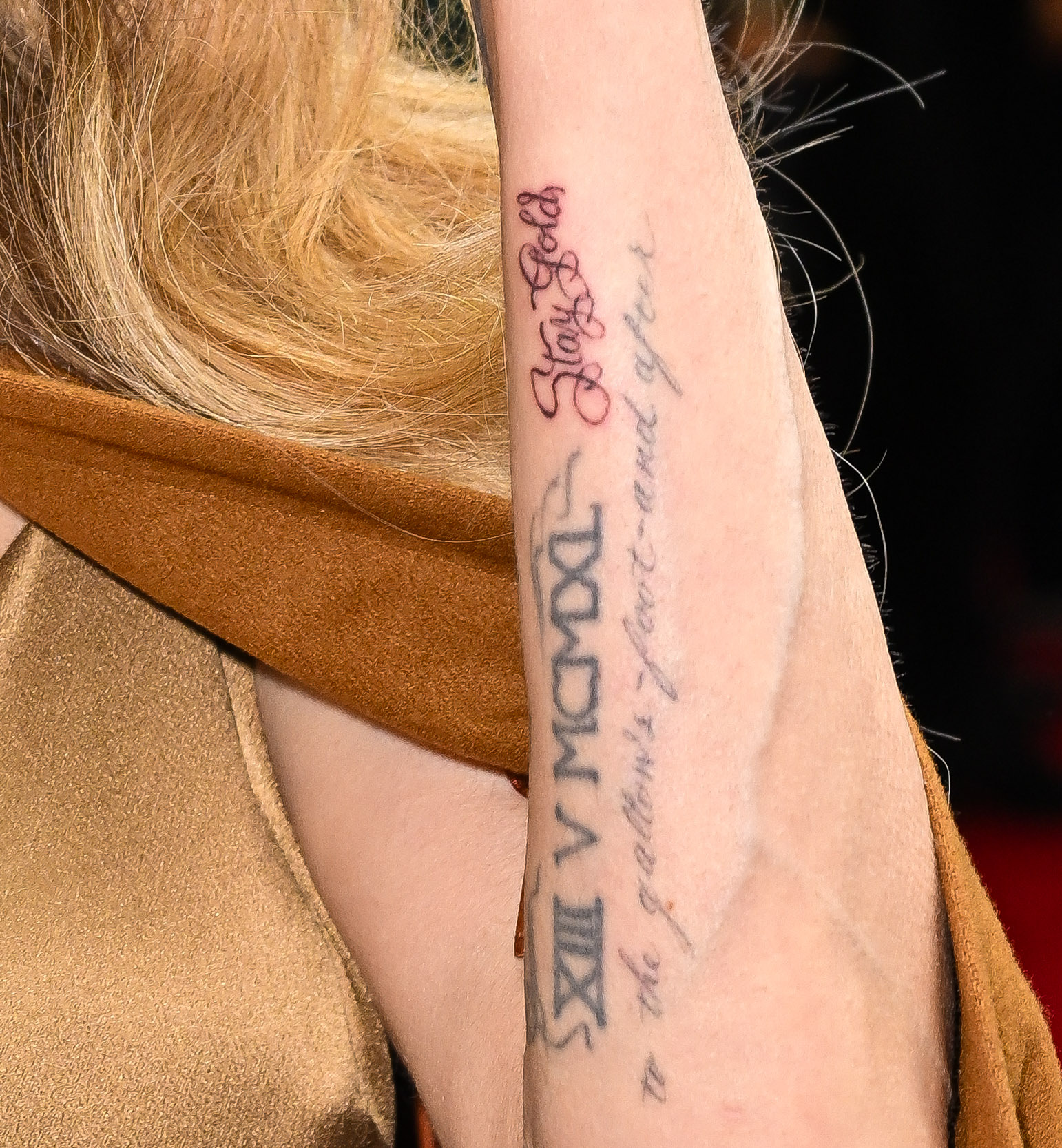 A close-up of Angelina Jolie's tattoo Angelin Jolie at the opening night of "The Outsiders" at The Bernard B. Jacobs Theatre on April 11, 2024 in New York City | Source: Getty Images