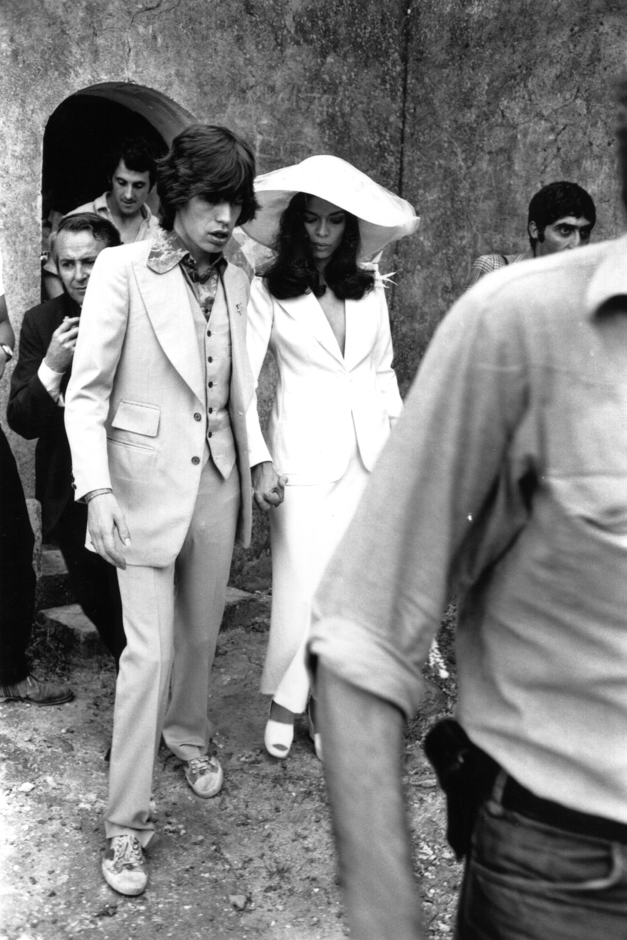 Mick Jagger and Bianca Jagger leave their wedding ceremony in St. Tropez, France, in 1971 | Source: Getty Images