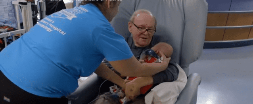A picture of 'ICU Grandpa' volunteering at Children's Healthcare of Atlanta | Photo/: YouTubeABCNews
