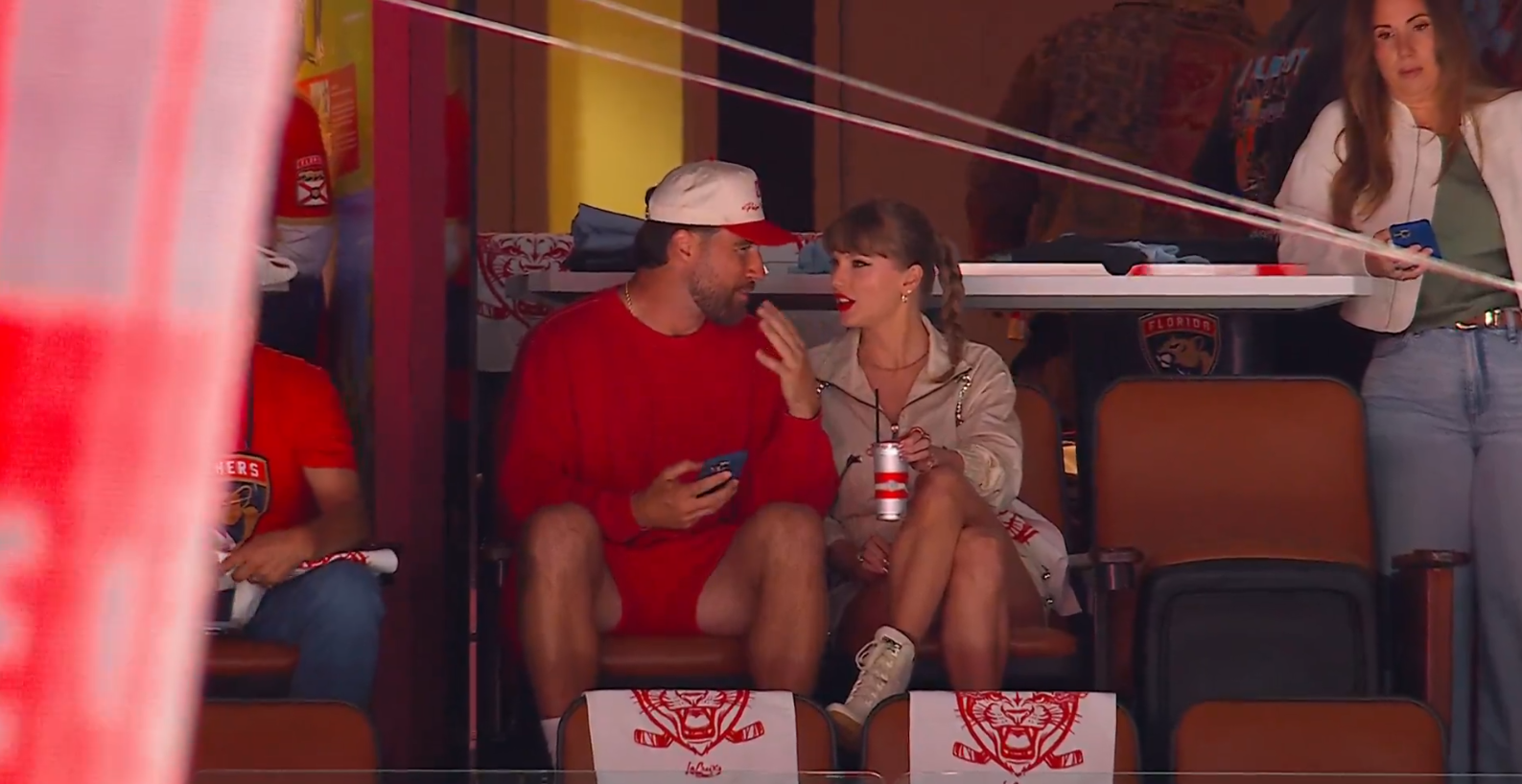 Travis Kelce and Taylor Swift talking during Game Four of the 2025 Stanley Cup Final at Amerant Bank Arena on June 12, 2025, in Sunrise, Florida | Source: X/Sportsnet