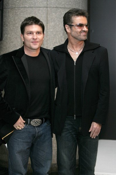 George Michael and Kenny Goss on December 15, 2005 at Cafe Les Deux Magots Paris in Tokyo, Japan. | Photo: Getty Images