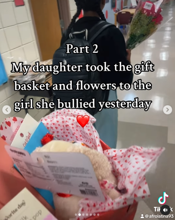 Dominique "Nique" Mackey and her daughter, Zariah, going to hand over the gift basket to apologize to a bullied girl in a clip posted on February 9, 2024 | Source: Instagram/afrolatina2