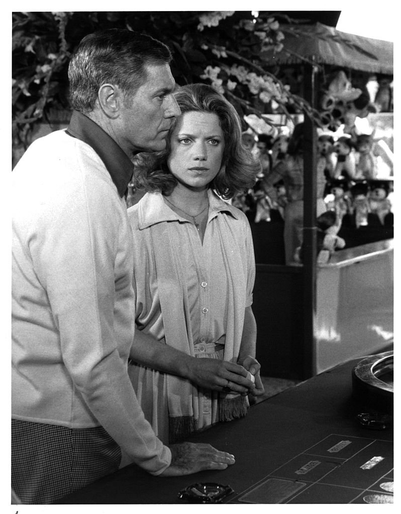 James Franciscus and actress Gretchen Corbett on set of the movie "Secrets of Three Hungry Wives" in 1978 | Photo: GettyImages