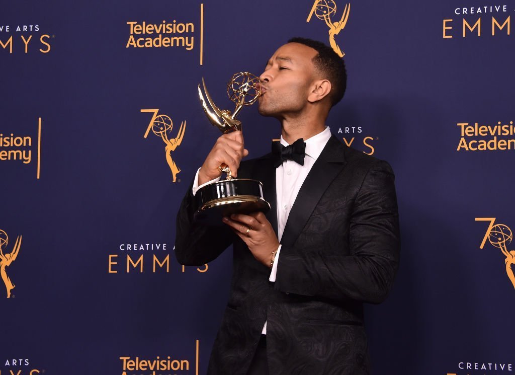 John Legend poses in the press room during the 2018 Creative Arts Emmys at Microsoft Theater on September 9, 2018, in Los Angeles, California. | Source: Getty Images.