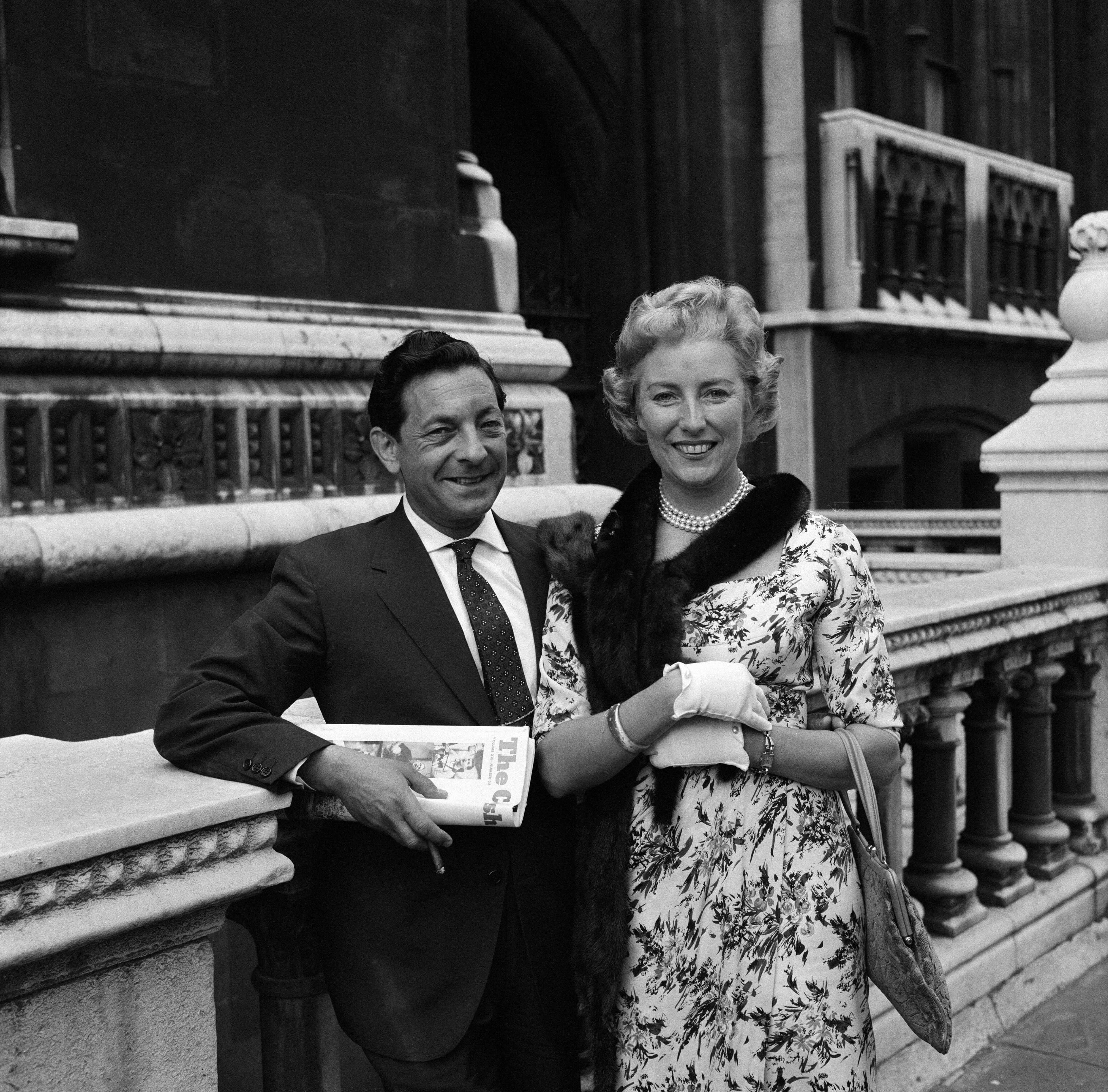 Vera Lynn and her husband Harry Lewis pictured after she was given judgement in a music copyright on May 31, 1960. | Source: Getty Images