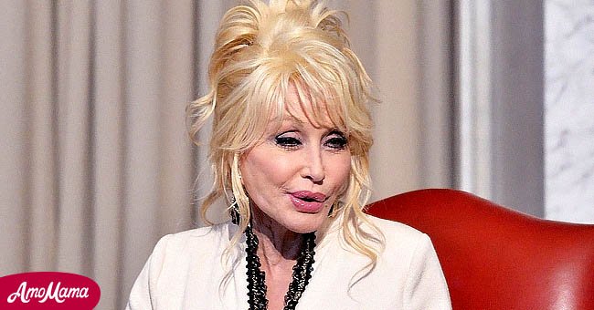 Singer Dolly Parton and her Imagination Library dontae the 100 millionth book to The Library of Congress on February 27, 2018 in Washington, DC. | Source: Getty Images