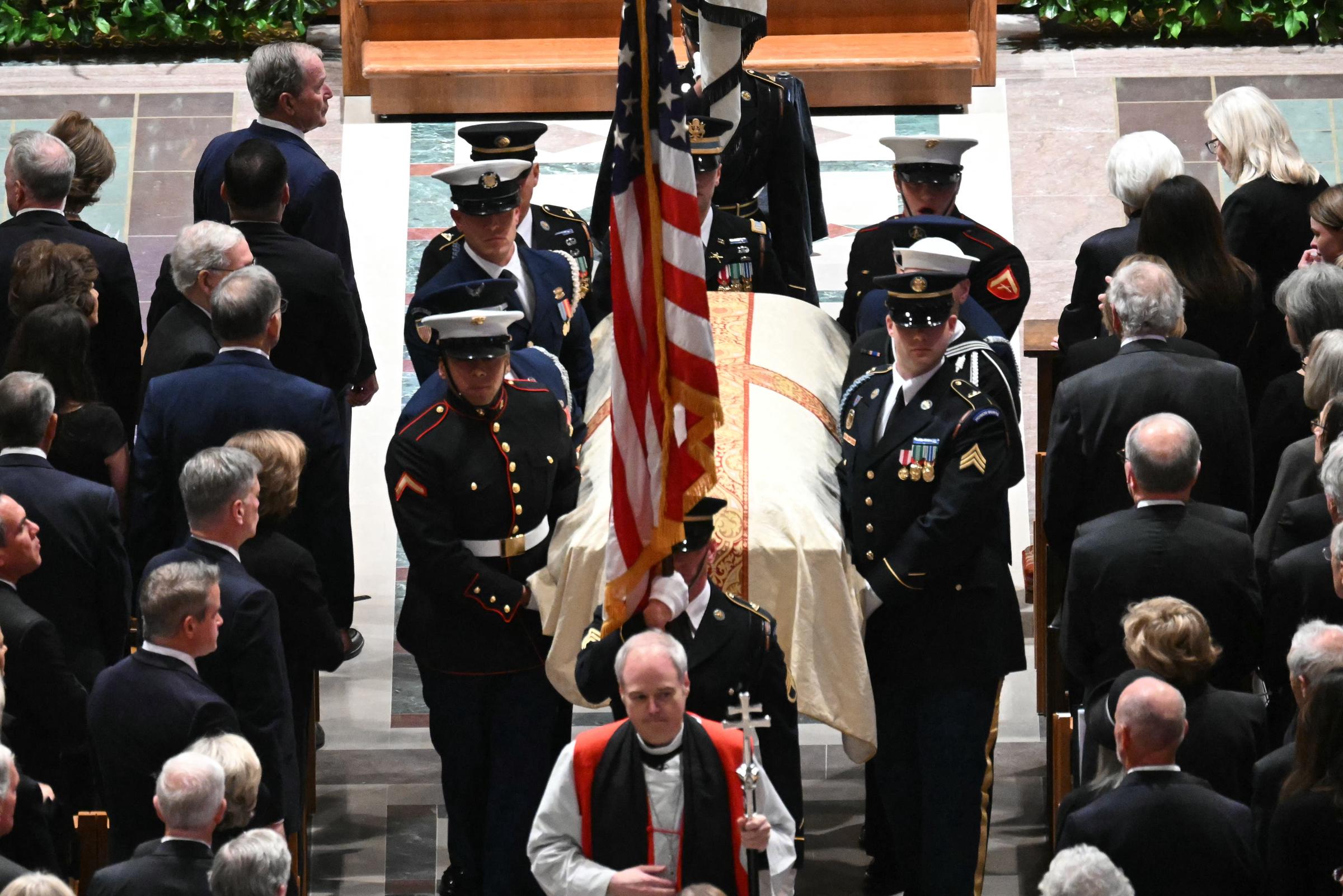 U.S. service members carry the casket of former U.S. Vice President Richard B. "Dick" Cheney during his funeral at the Washington National Cathedral on November 20, 2025 | Source: Getty Images