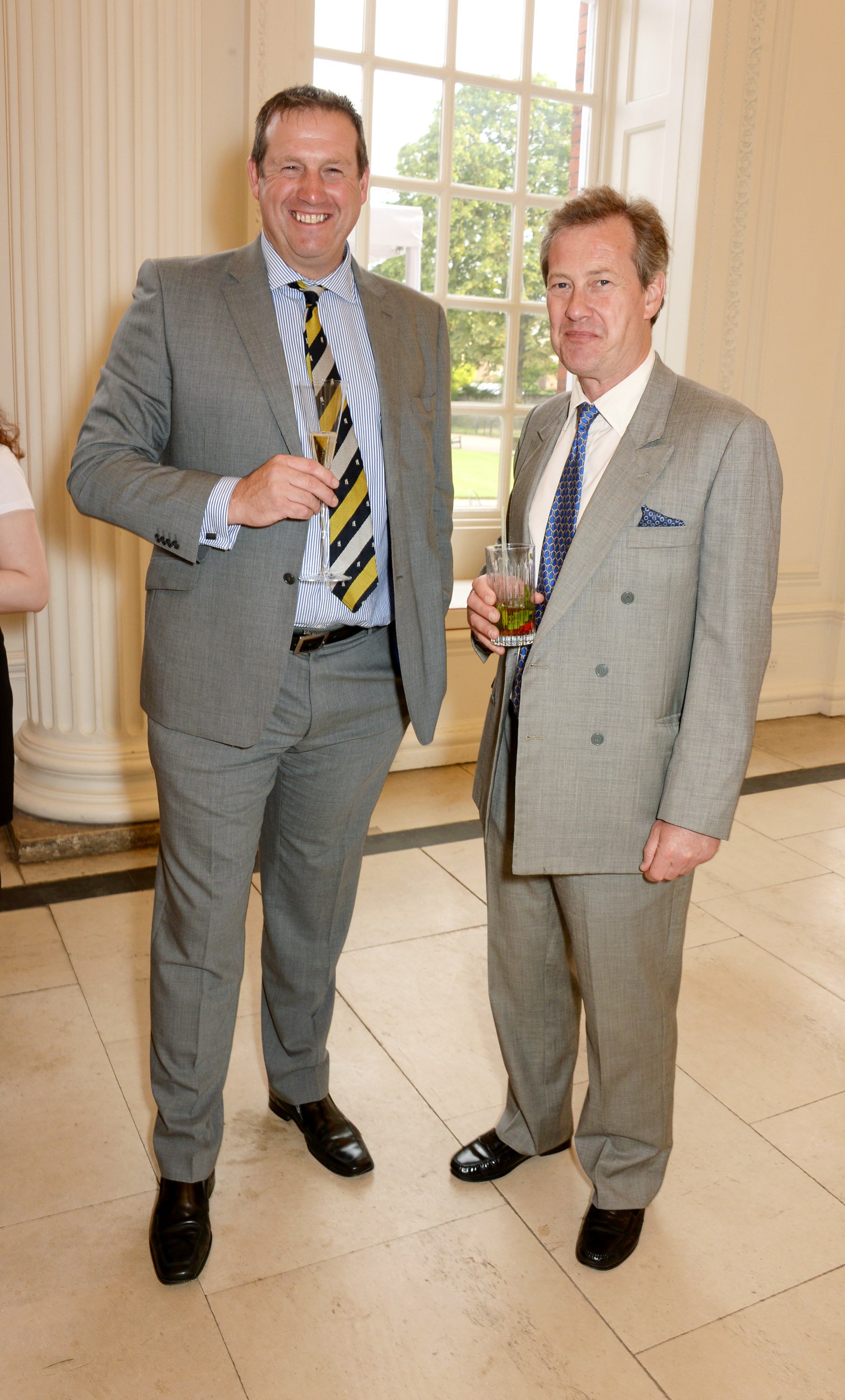 Tim Munton and Lord Ivar Mountbatten at Kensington Palace on the eve of 'Dockers Flannels For Heroes' cricket match on June 19, 2014 | Photo: GettyImages