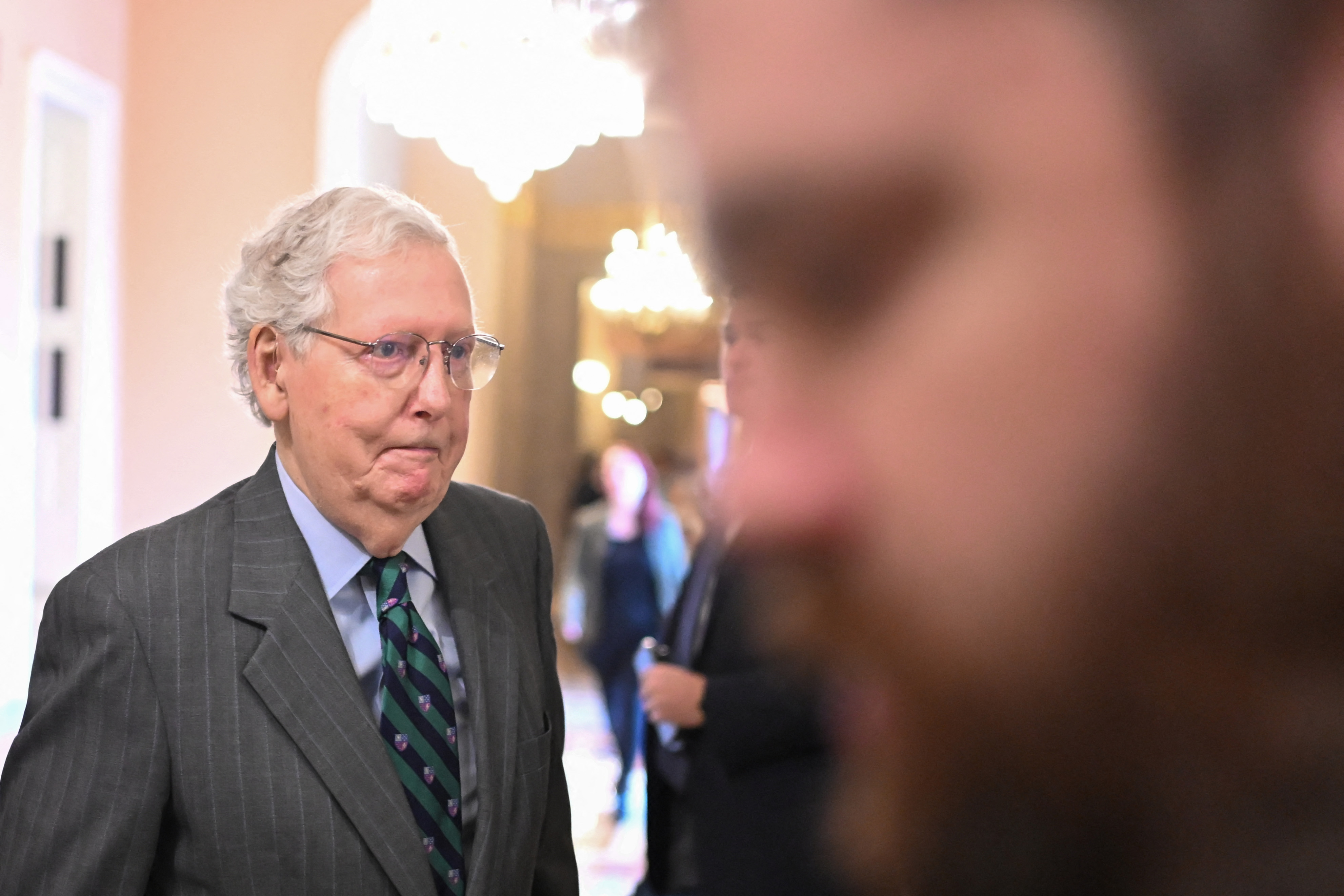 McConnell is seen walking through the U.S. Capitol in Washington, D.C., on July 16, 2025. In his recent statement, the Kentucky senator said he is continuing his recovery at a rehabilitation center and hopes to return to the Senate floor as soon as his doctors allow. | Source: Getty Images