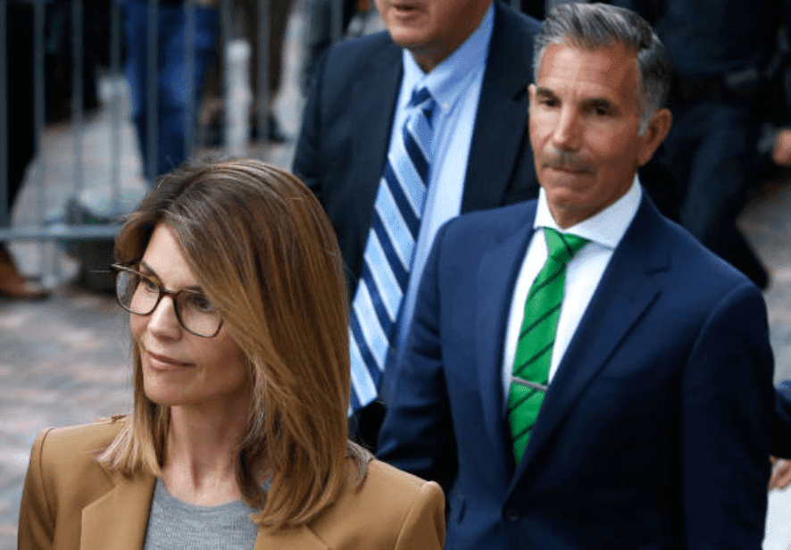 Lori Loughlin and her husband, Mossimo Giannulli as they leave the John Joseph Moakley United States Courthouse, on April 3, 2019, Boston | Source: Jessica Rinaldi/The Boston Globe via Getty Images