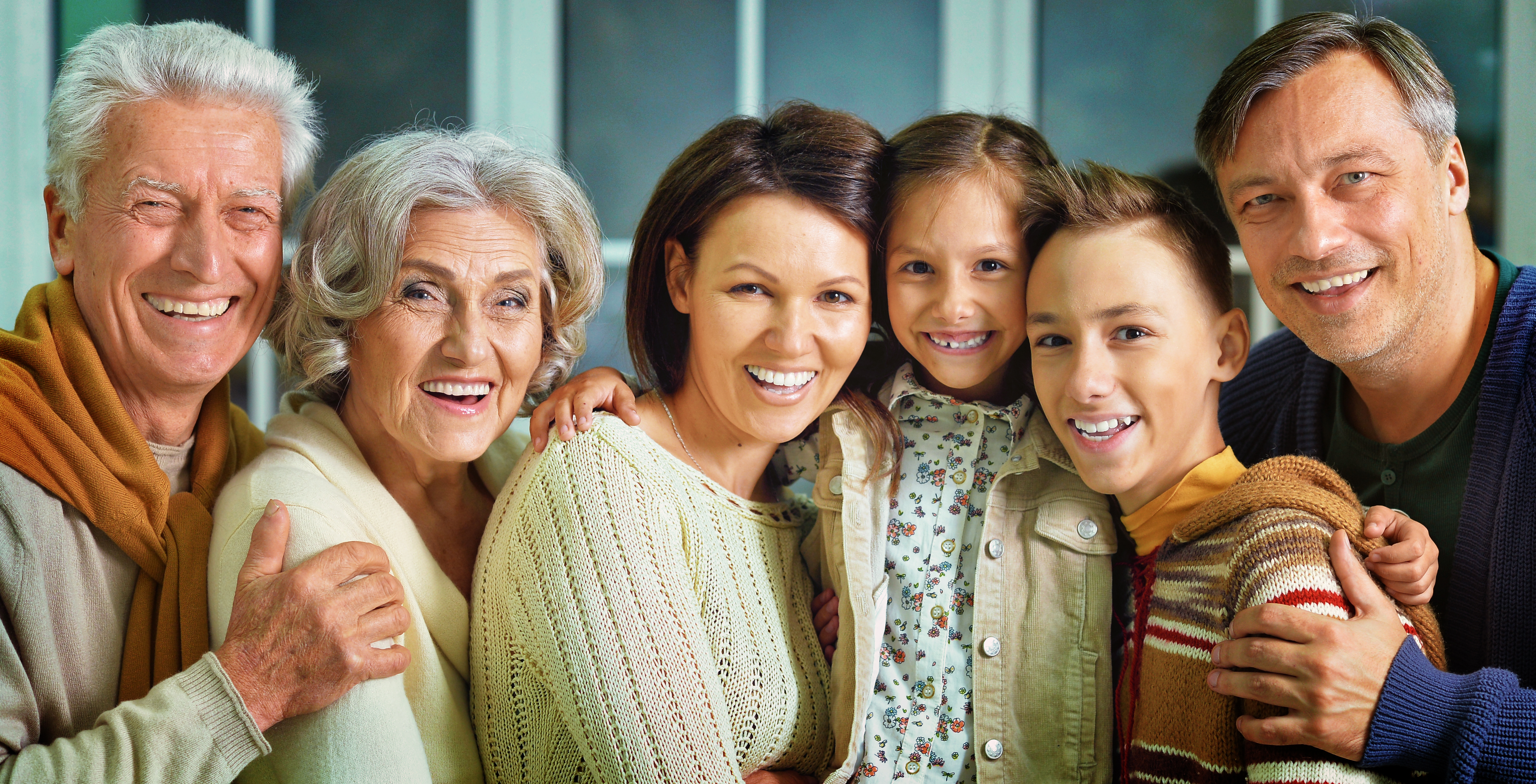 A happy family gathered together | Source: Shutterstock