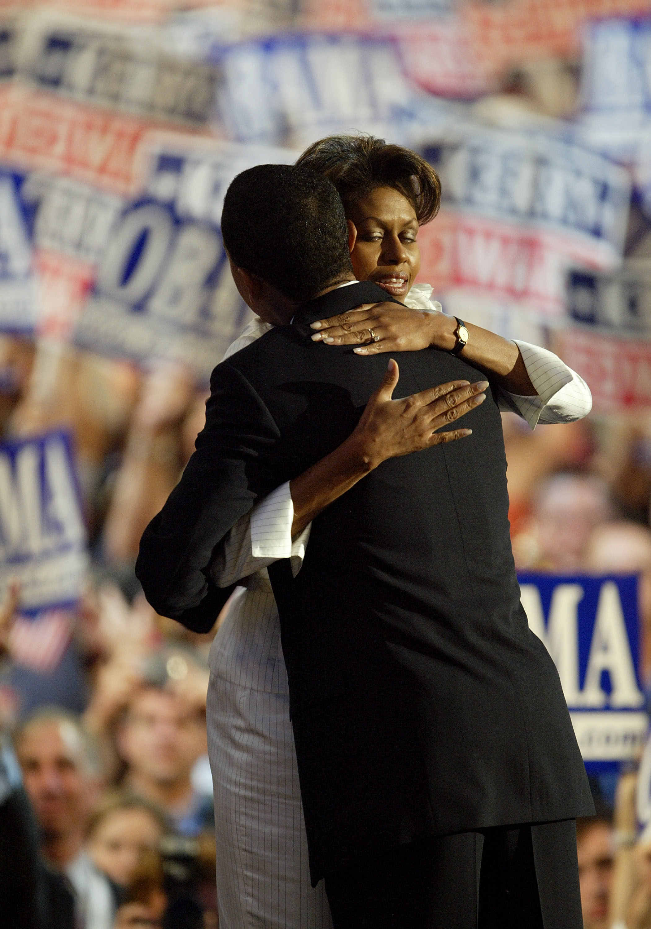 Michelle and Barack Obama embracing after he delivered the keynote address at the Democratic National Convention on July 27, 2004, in Boston, Massachusetts. | Source: Getty Images