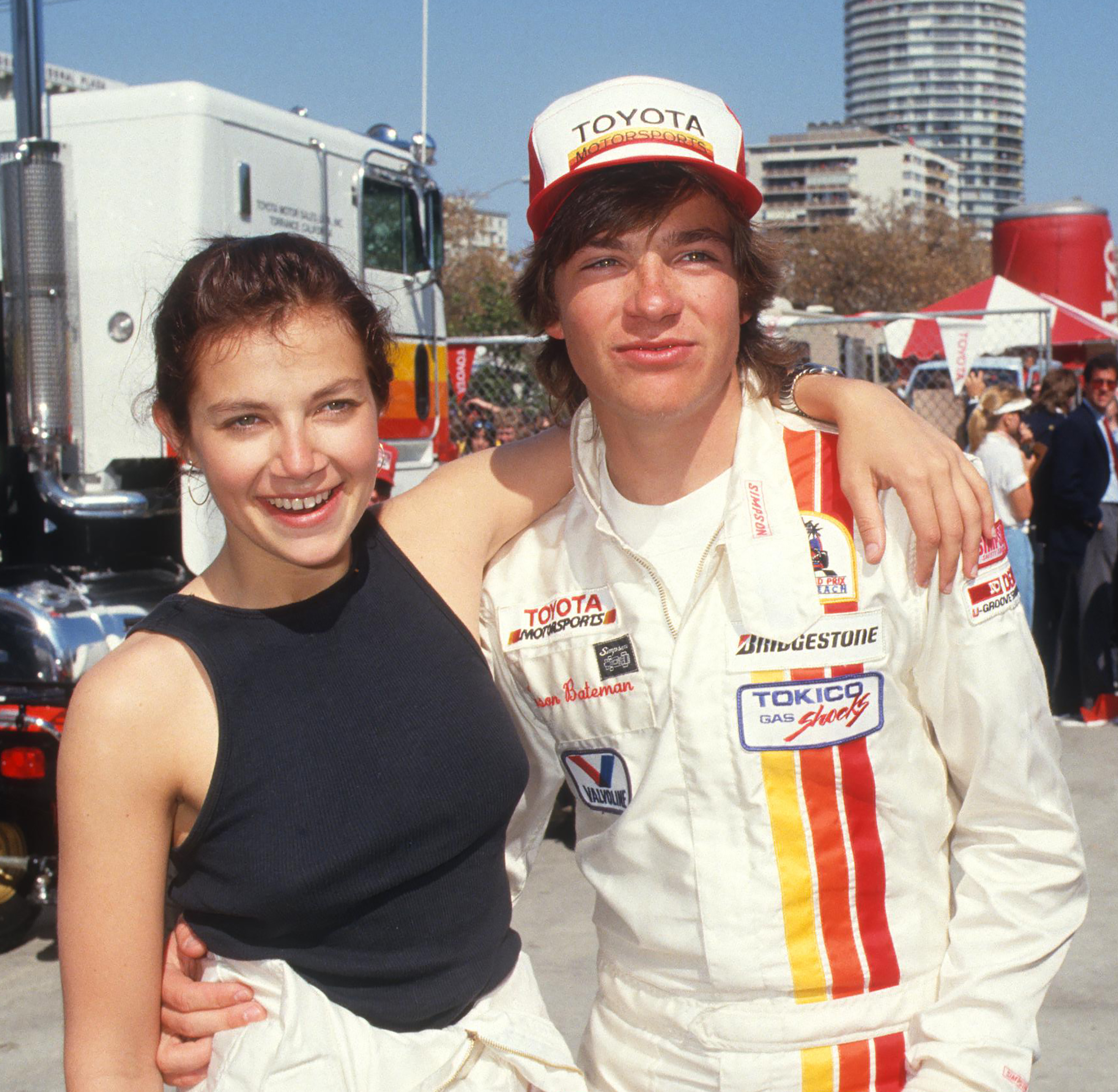 Justine Bateman and Jason Bateman at the Toyota Pro-Celebrity Grand Prix Classic in 1987, in Long Beach, California. | Source: Getty Images