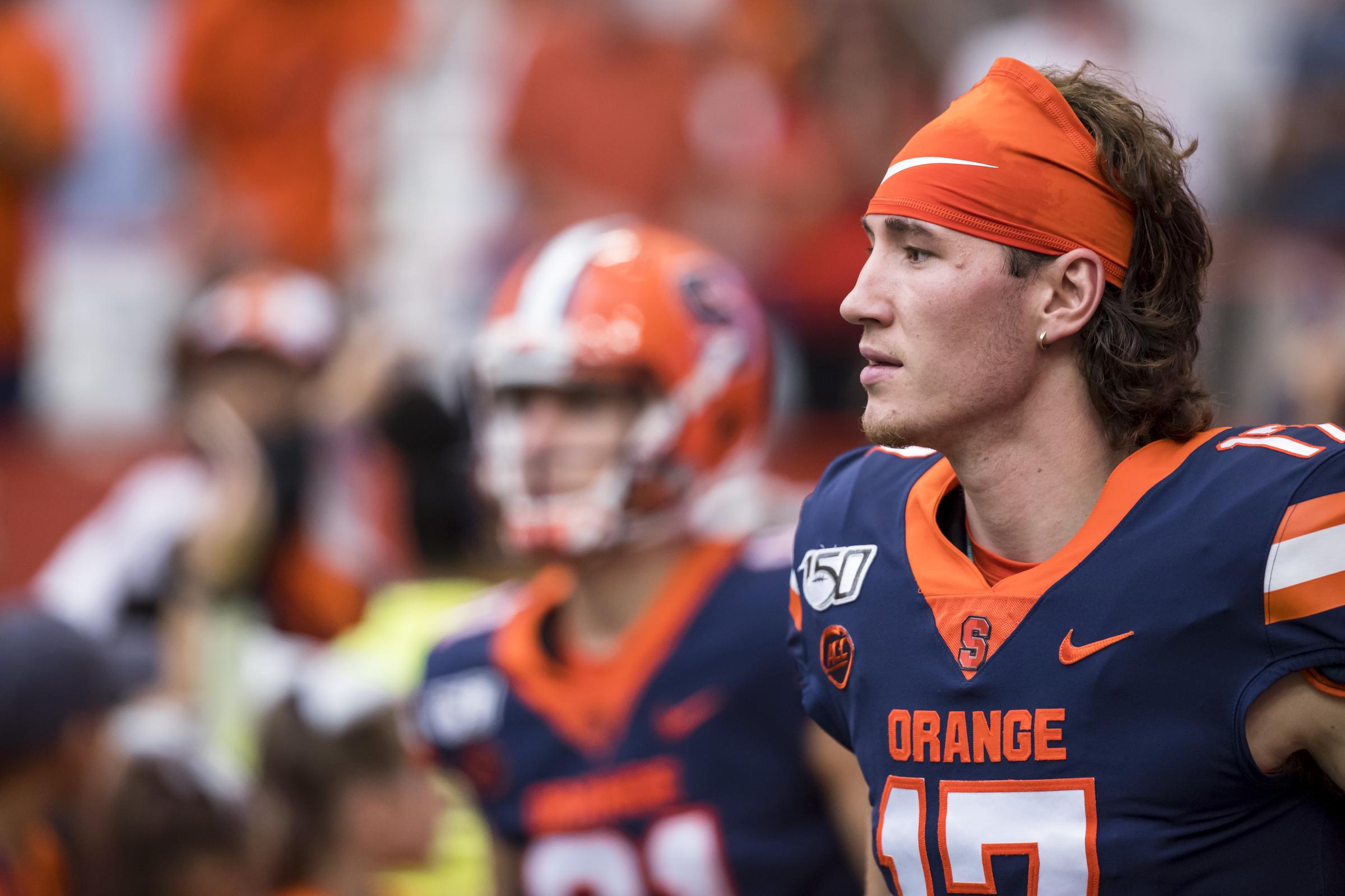 Rex Culpepper runs onto the field before a game against the Holy Cross Crusaders at the Carrier Dome on September 28, 2019 | Source: Getty Images