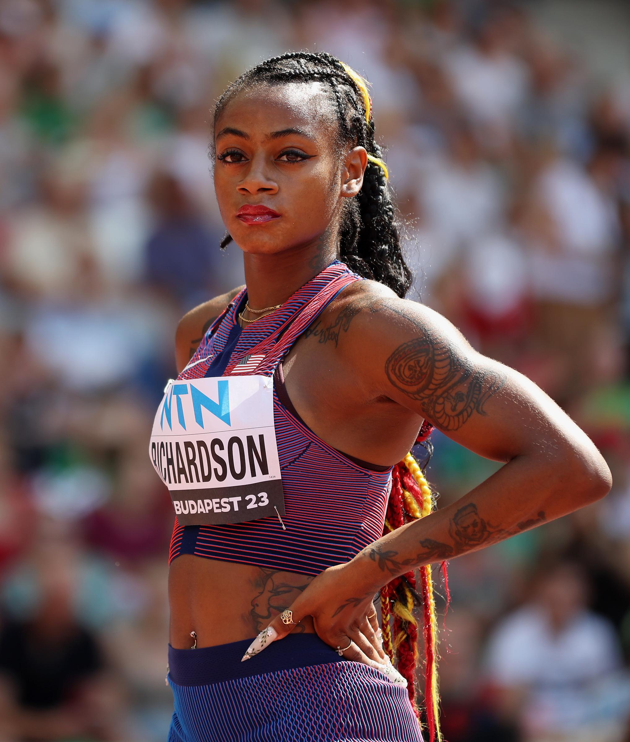 Sha'Carri Richardson looks on in the Women's 200m Heats during the World Athletics Championships Budapest 2023 on August 23, 2023, in Budapest, Hungary. | Source: Getty Images