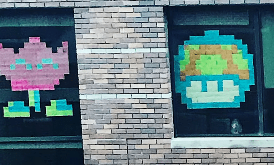 Creative Post-it note art that was used to communicate from one building to another | Photo: Youtube/Good Morning America
