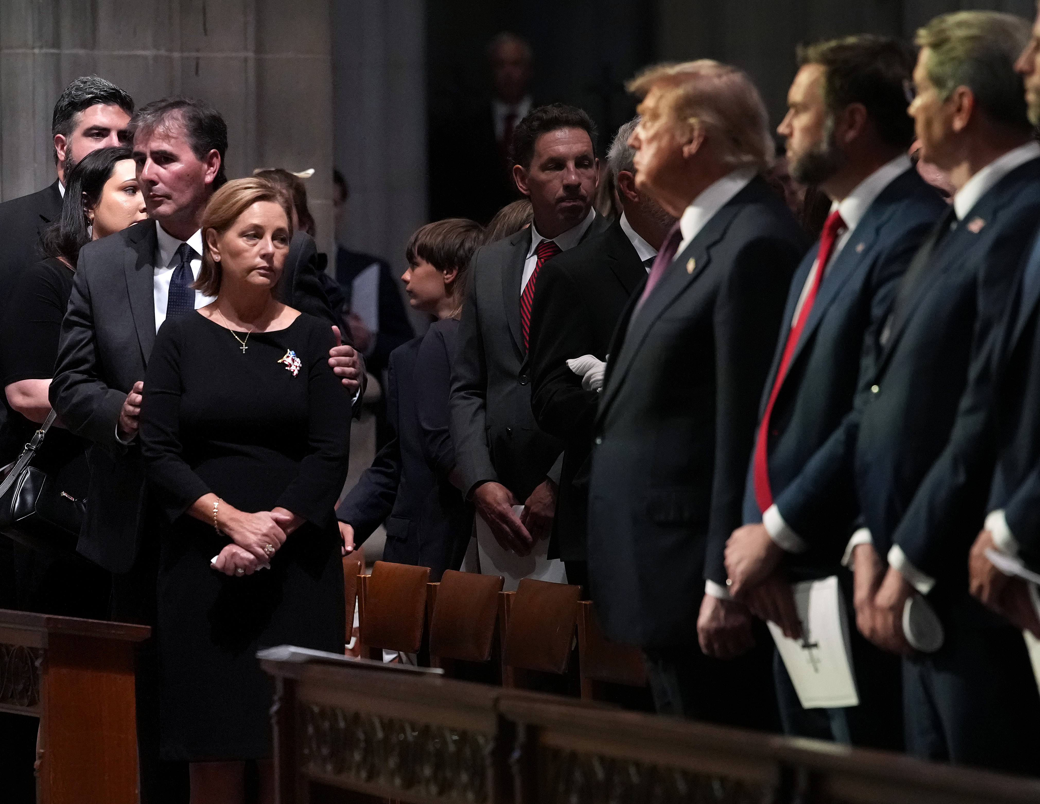 Family members and mourners gather at the conclusion of the funeral service for late Sen. Lindsey Graham at Washington National Cathedral. Trump said Graham regarded raising his younger sister, Darlene Graham Nordone, as his greatest accomplishment. | Source: Getty Images