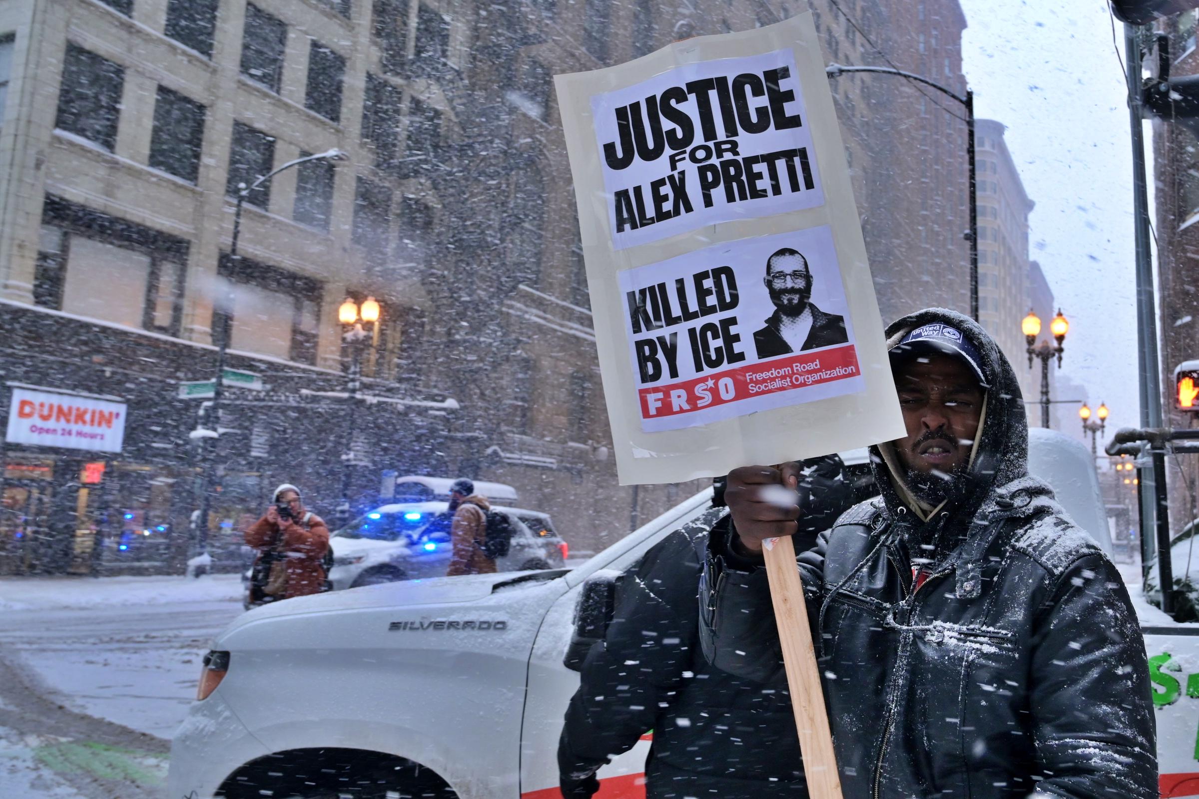 Demonstrators gather on Michigan Avenue during a heavy snowstorm to protest against ICE in Chicago, US on January 25, 2026. | Source: Getty Images