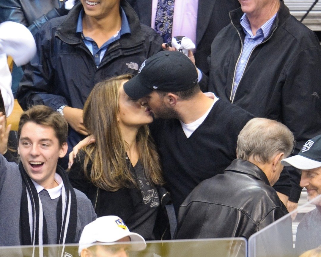 Alyssa Milano and husband David Bugliari kiss at the conclusion of an NHL playoff game between the St. Louis Blues and the Los Angeles Kings at Staples Center on May 10, 2013 in Los Angeles, California. | Source: Getty Images