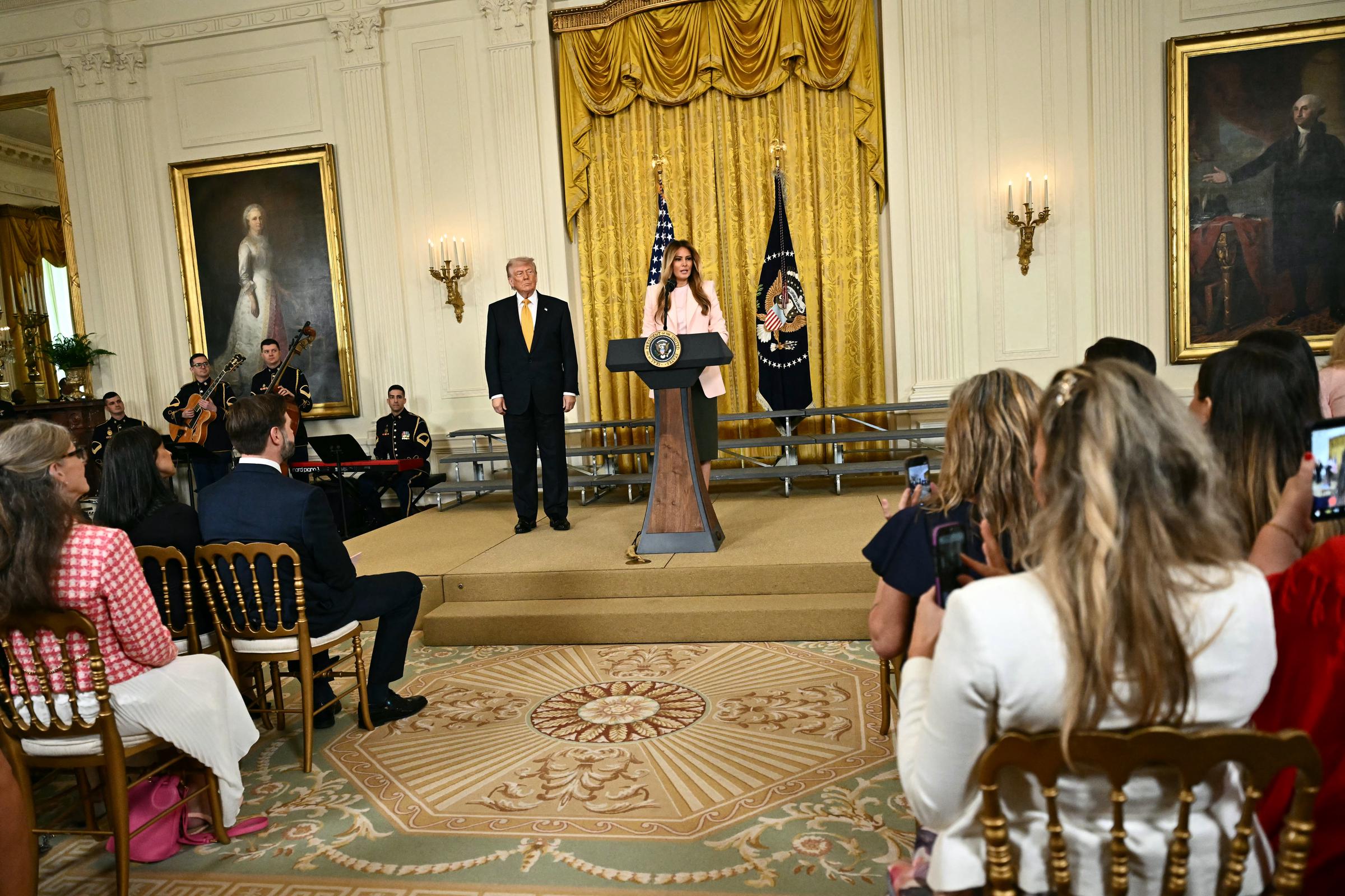 Donald and Melania Trump participate in a Military Mother's Day Event in the East Room of the White House in Washington, DC, on May 6, 2026 | Source: Getty Images