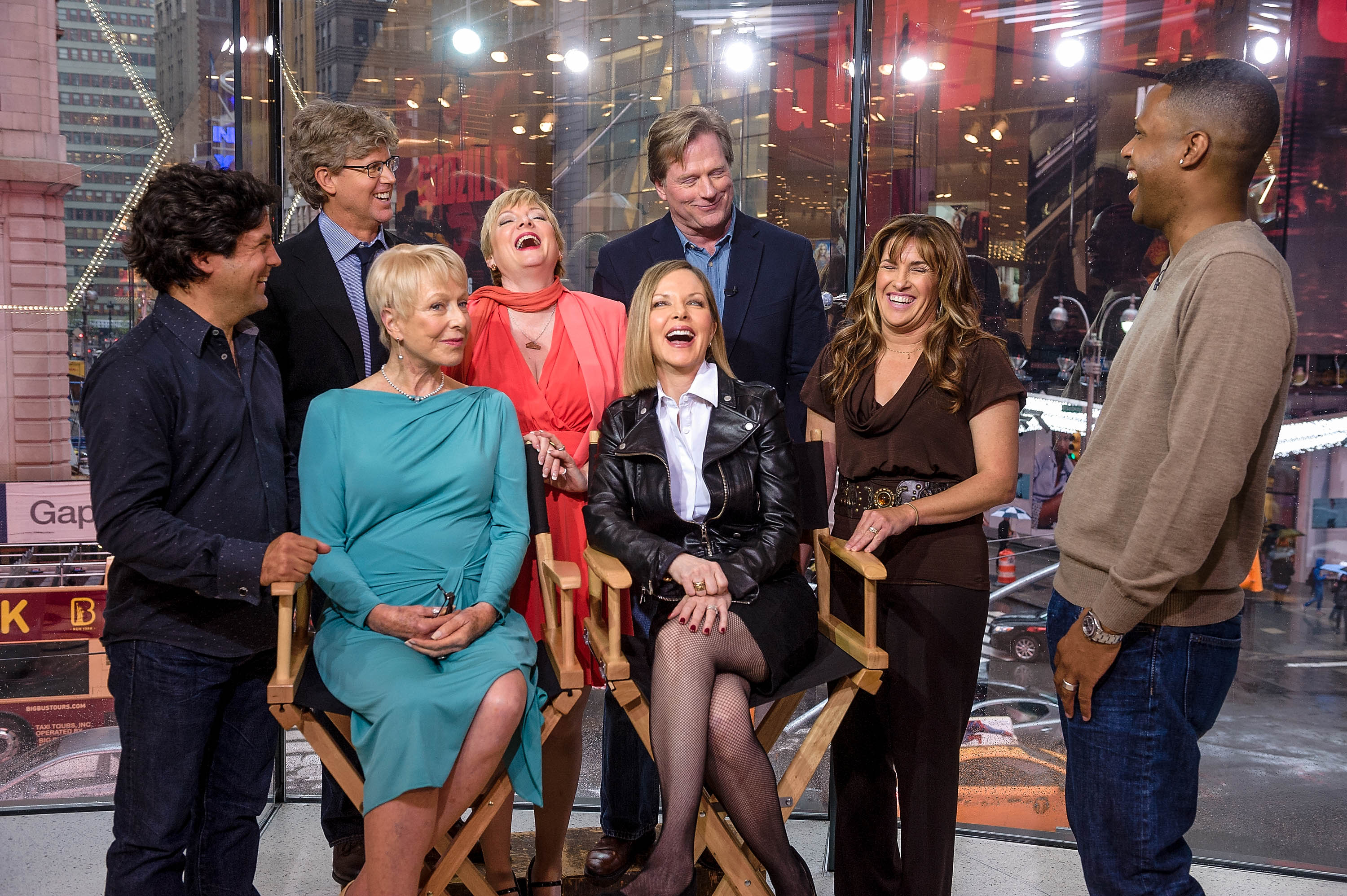 Pictured: (L-R standing) Matthew Labyorteaux, Michael Landon, Jr., Alison Arngrim, Dean Butler, Lindsay Greenbush, (L-R seated) Karen Grassle, and Melissa Sue Anderson of "Little House on the Prairie" interviewed by AJ Calloway (R) during their visit to "Extra" at their New York studios at H&M in Times Square on April 30, 2014 in New York City. | Source: Getty Images