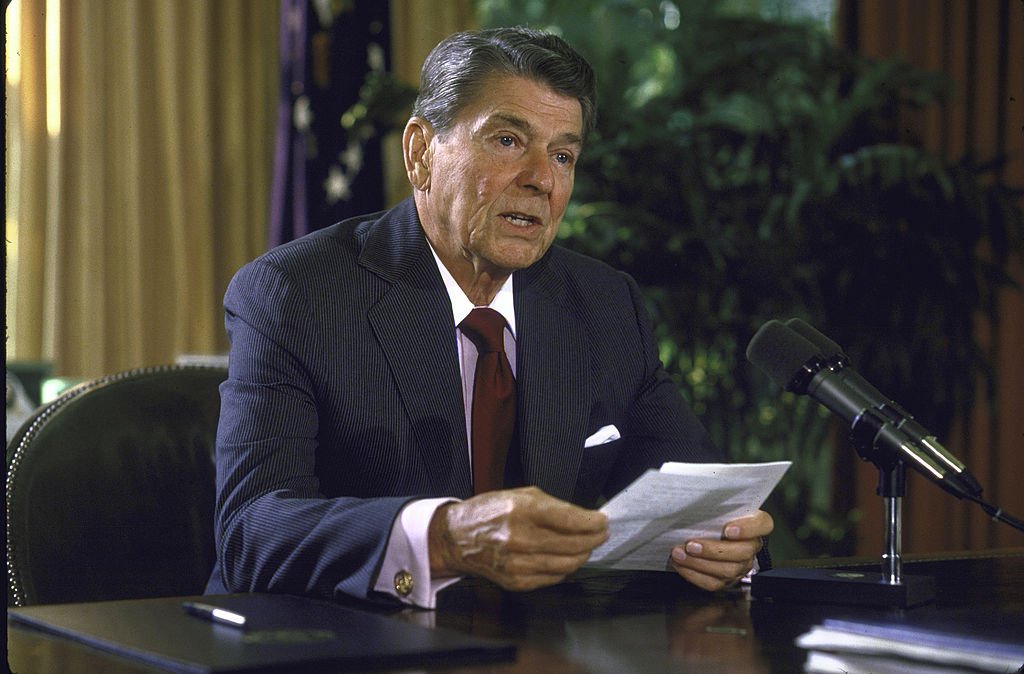 United States President Ronald W. Reagan, looking serious as he announces his directive on South Africa in the Oval Office on September 1, 1985 | Source: Getty Images