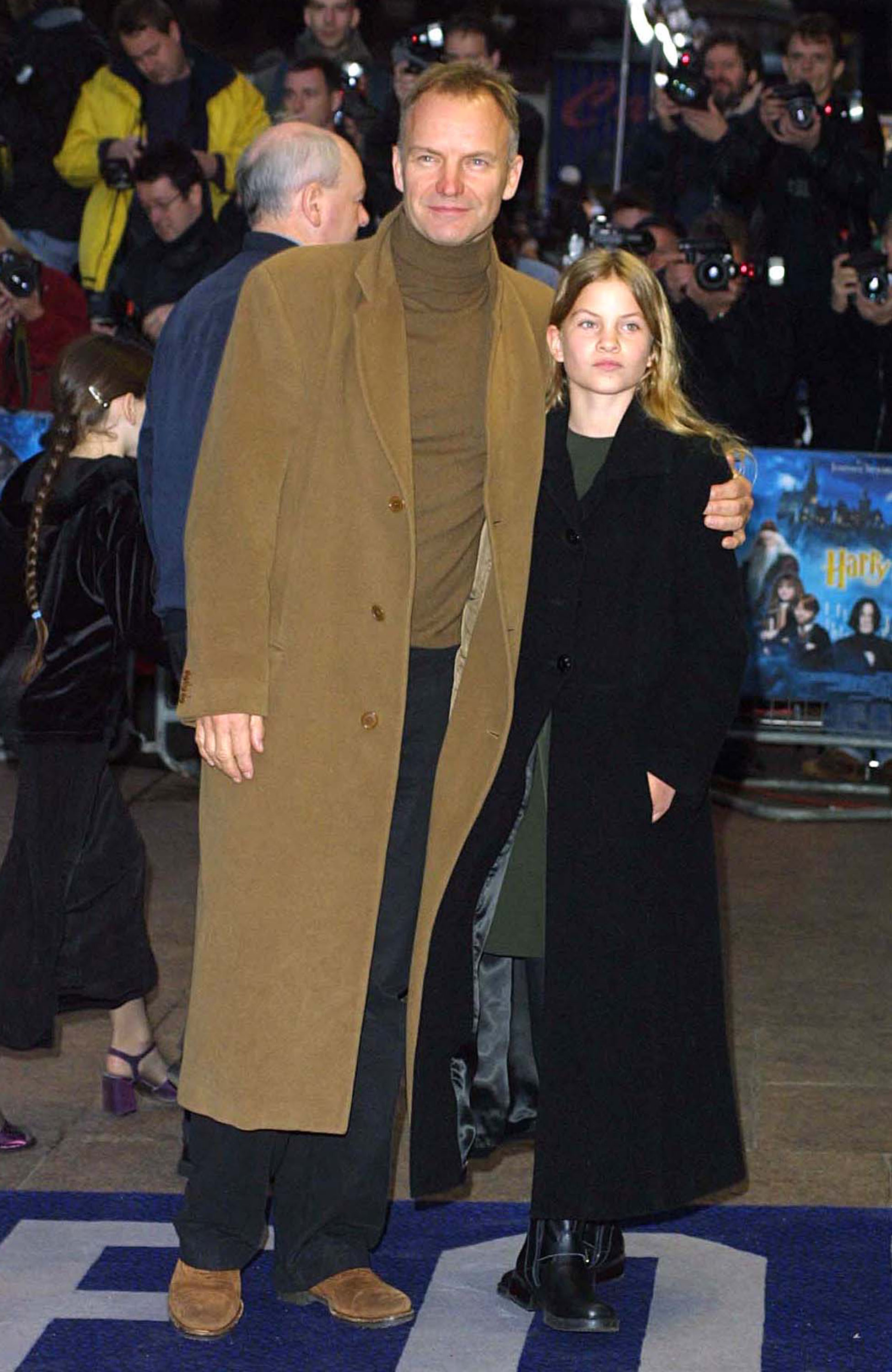 Sting and his child Eliot Sumner attend the world premiere of "Harry Potter and the Philosopher's Stone" on November 4, 2001 in London, England | Source: Getty Images