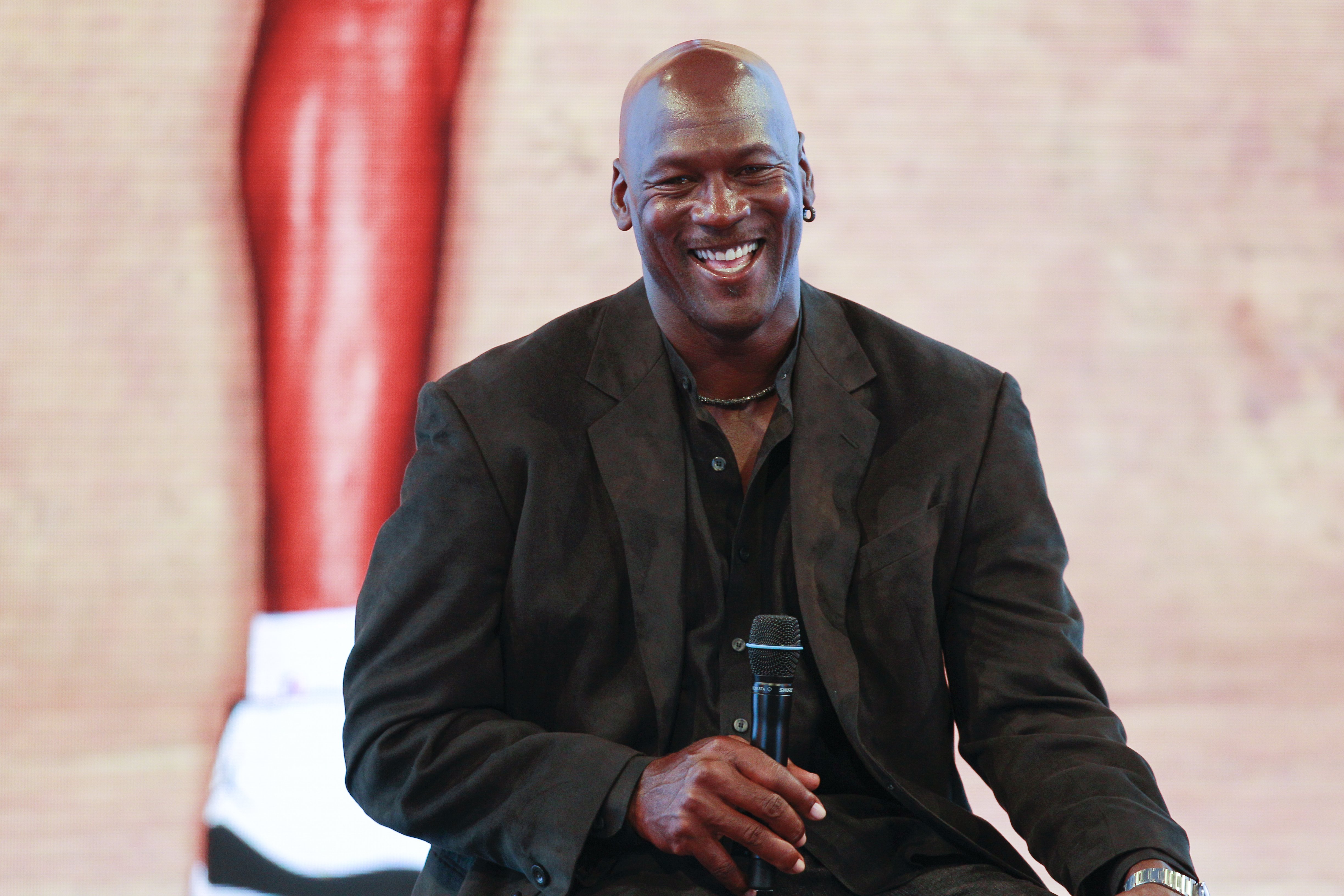 Michael Jordan attends a press conference for the celebration of the 30th anniversary of the Air Jordan Shoe during the 'Palais 23' interactive exhibition dedicated to Michael Jordan at Palais de Tokyo in Paris on June 12, 2015 | Photo: GettyImages