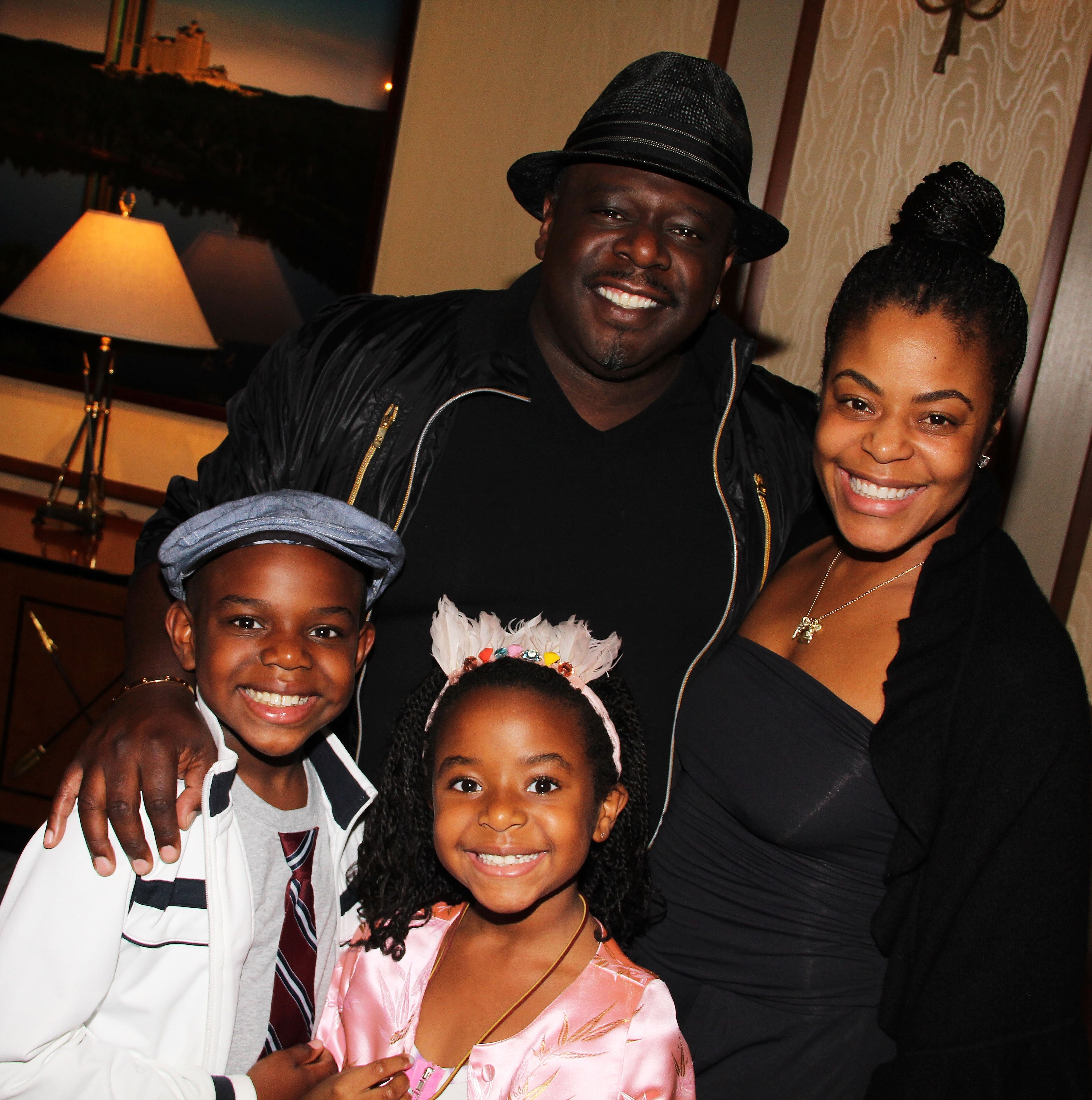 Croix Alexander Kyles and Lucky Rose Kyles with their parents, Cedric the Entertainer and Lorna Wells, at the broadway musical of "Spider-Man: Turn Off The Dark," at The Foxwood Theater in New York City, on July 29, 2011. | Source: Getty Images