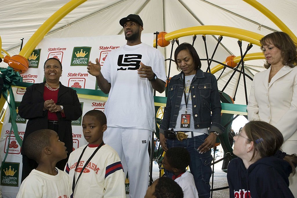LeBron James and his mother attending a playground dedication in behalf of the LeBron James Family Foundation in February 2008. | Photo: Getty Images