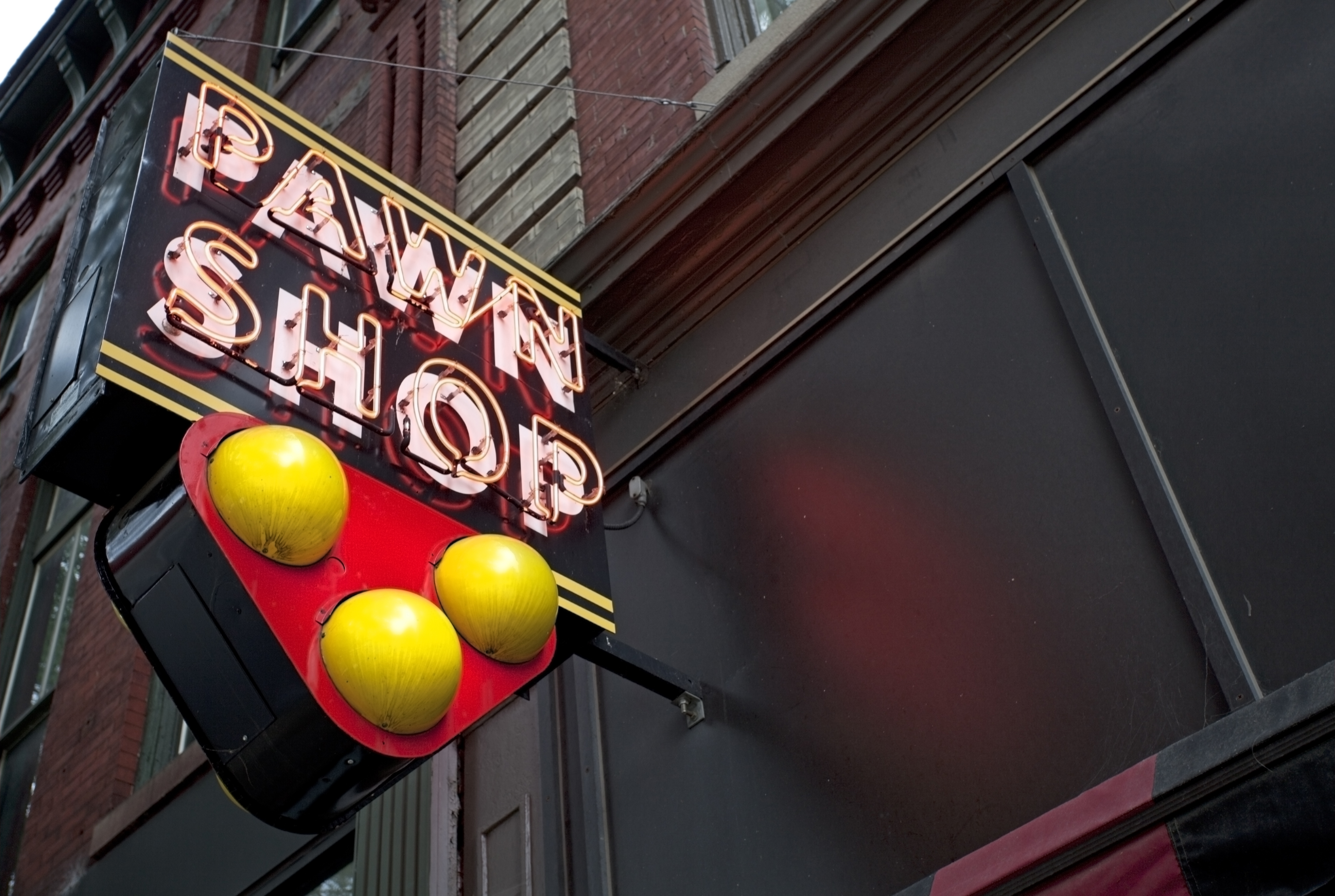 Neon pawn shop sign | Source: Shutterstock