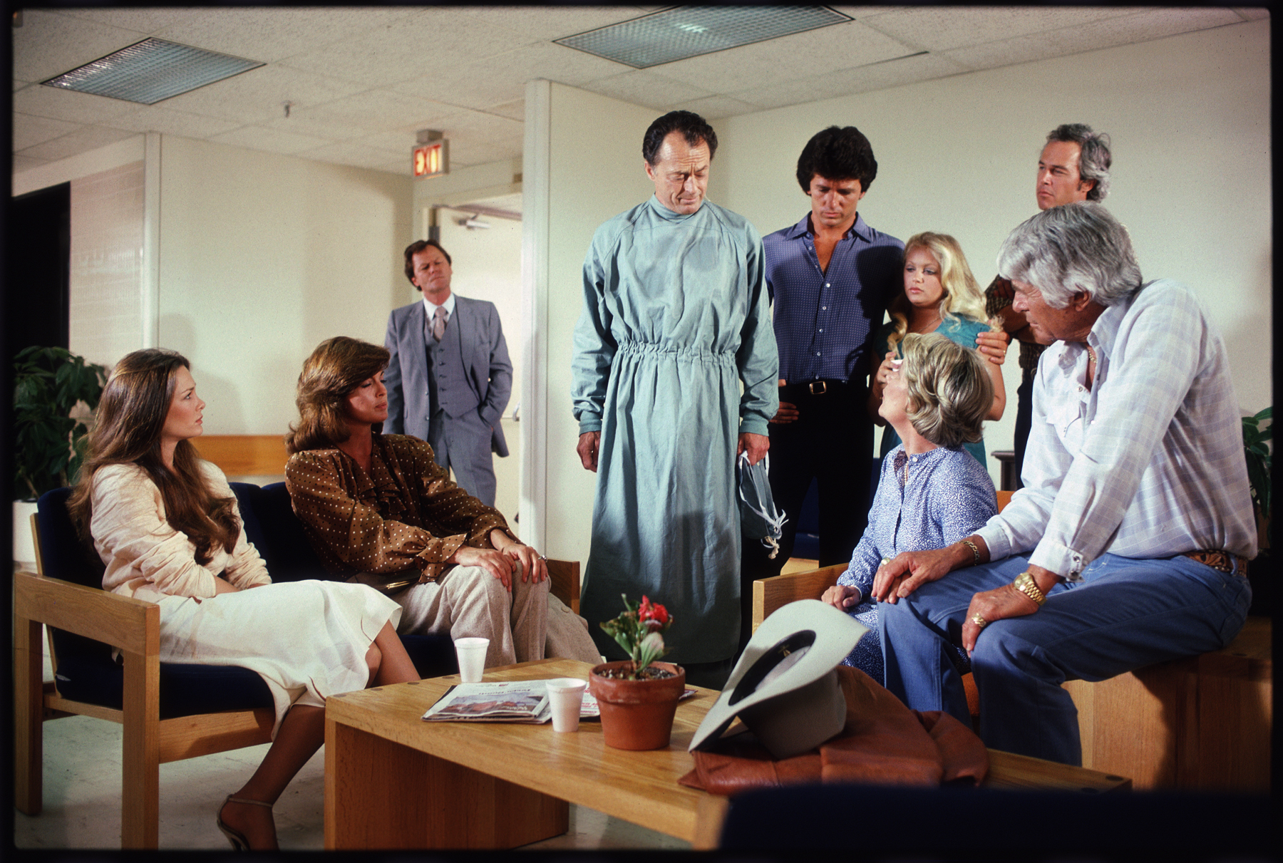 From left, Mary Crosby, Linda Gray, Ken Kercheval, Peter Donat, Patrick Duffy, Charlene Tilton, Barbara Bel Geddes, Steve Kanaly, and Jim Davis in a scene from the TV show "Dallas." | Source: Getty Images