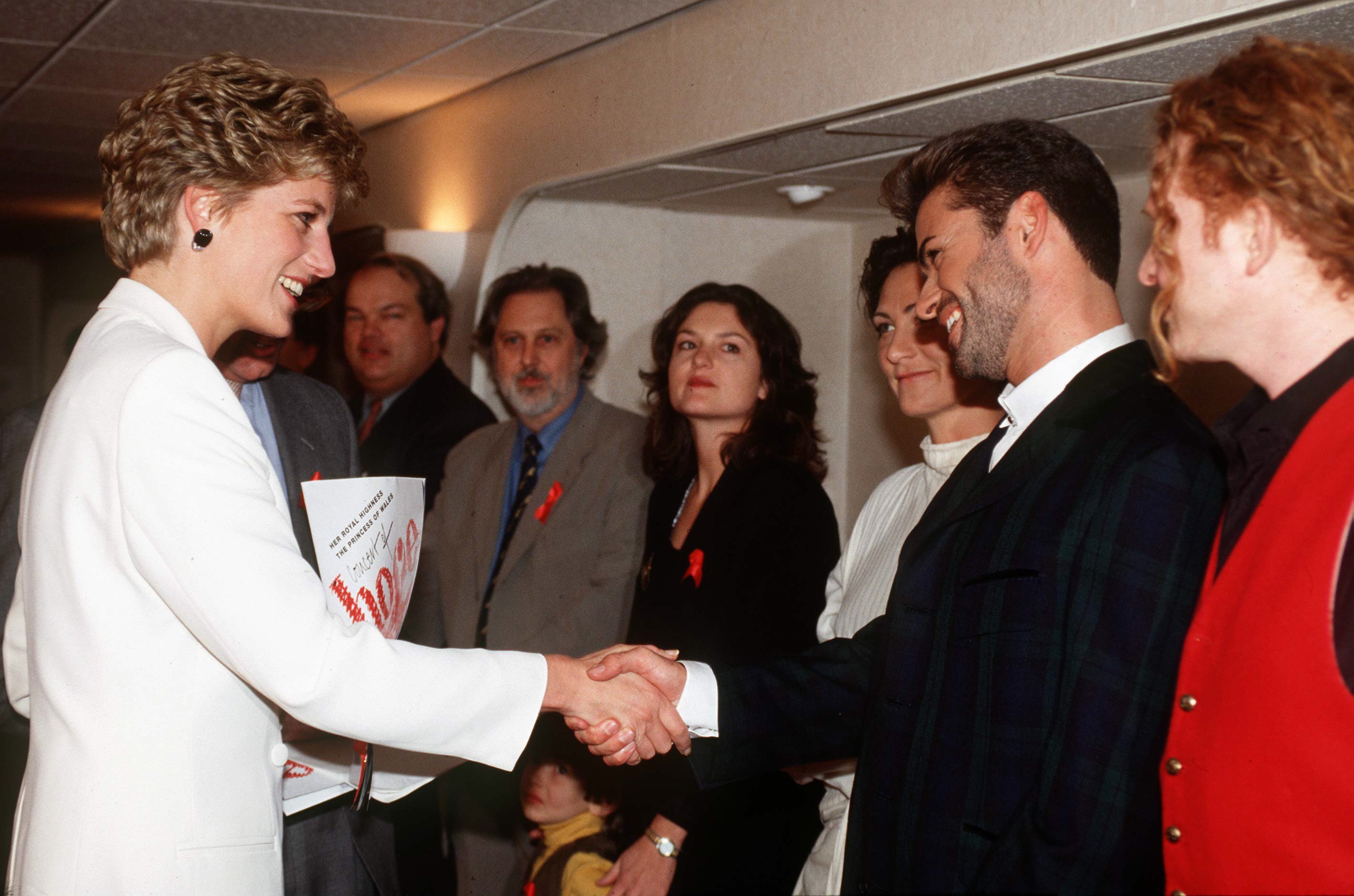 Diana, Princess of Wales meets singer George Michael at Wembley Arena in London, for the Concert of Hope, a benefit concert on World AIDS Day, 2nd December 1993 | Source: Getty Images