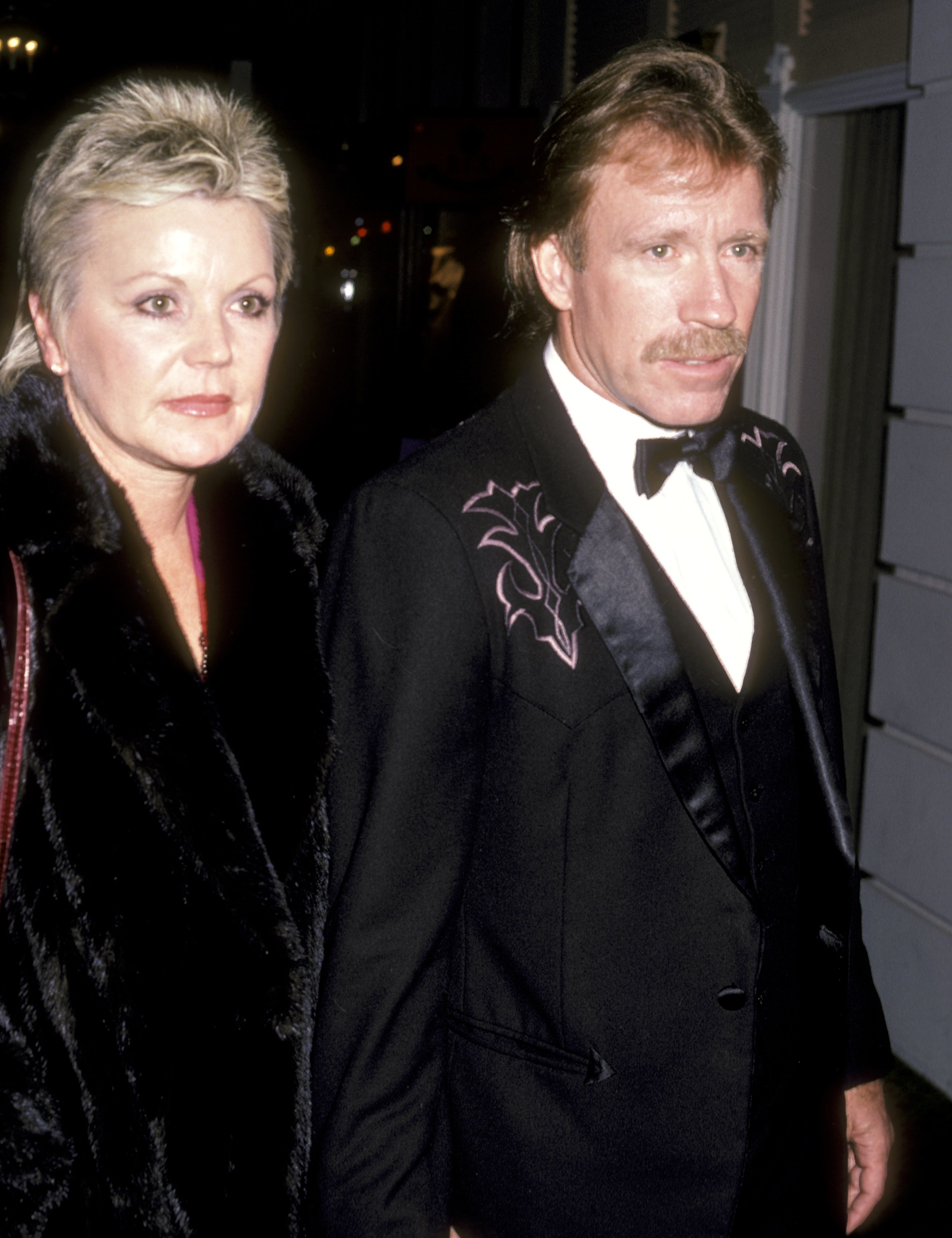 Chuck Norris and Diane Holechek are photographed at the "Runaway Train" Beverly Hills Premiere Party on December 5, 1985, at Beverly Hills Hotel in Beverly Hills | Source: Getty Images