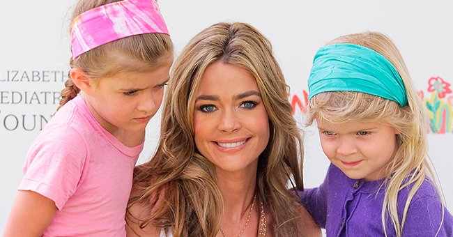 Denise Richards with her daughters Sami (L) and Lola Sheen (R) at the 21st annual "A Time For Heroes" celebrity picnic on June 13, 2010, in Los Angeles, California | Photo: Noel Vasquez/Getty Images