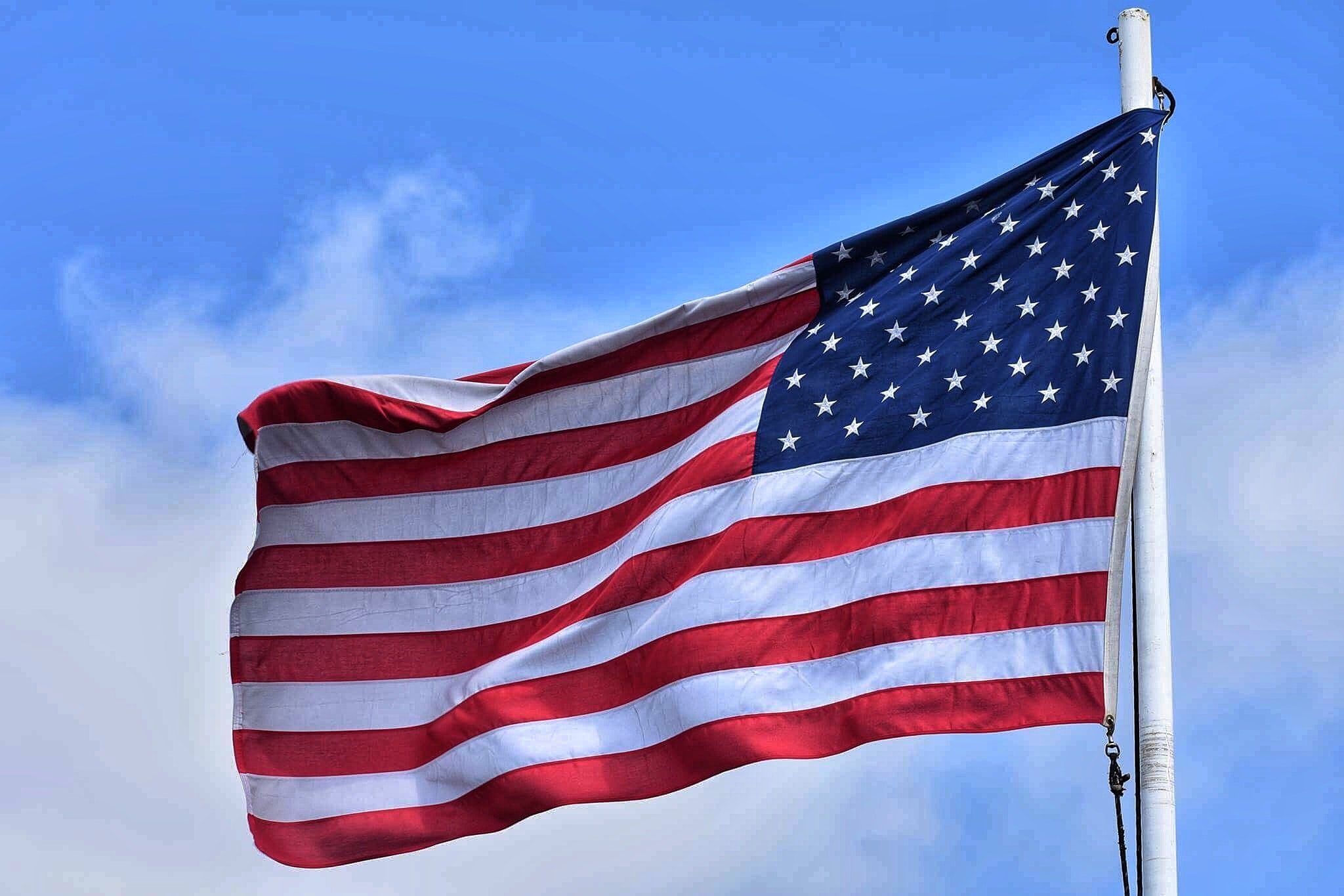 Pictured - Flag of US displaying on a pole | Source: Pexels 