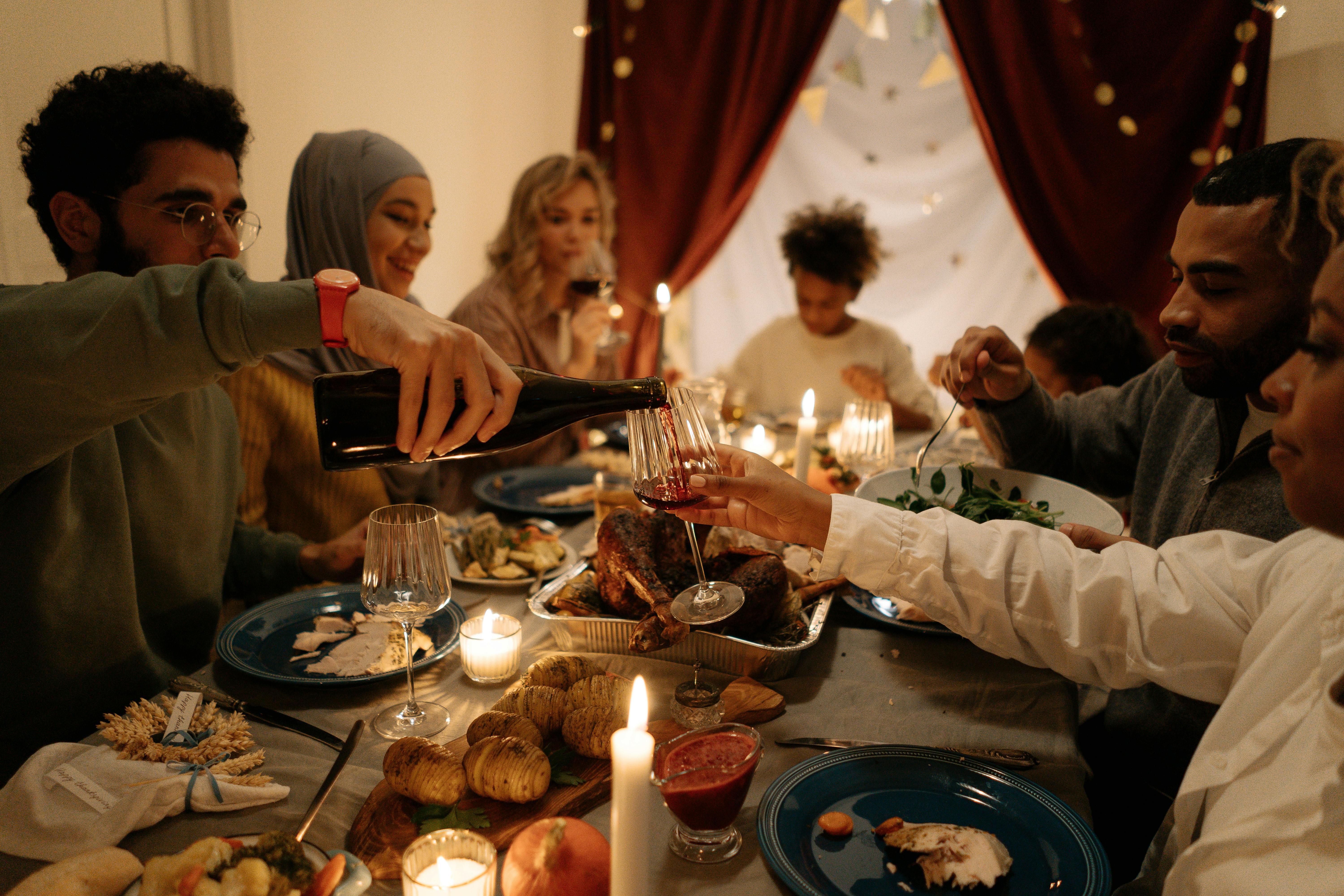 Family seated around a table | Source: Pexels