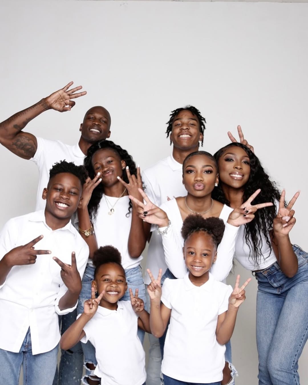 Chad "Ochocinco" Johnson pictured with some of his children, dated January 9, 2021 | Source: Instagram/jicyraa