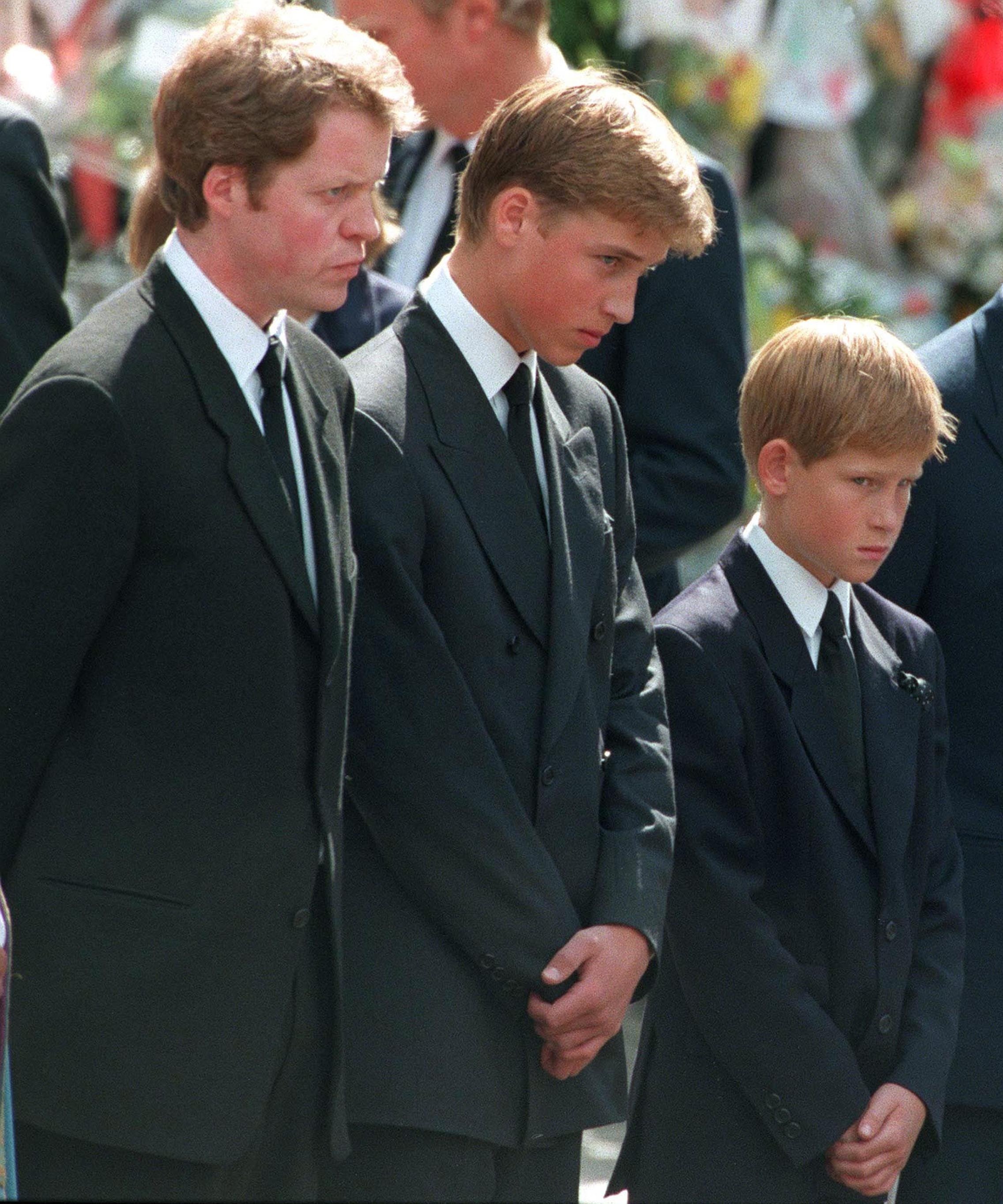 Princes William and Harry with their uncle, Charles Spencer, outside Westminster Abbey on the day of their mother's funeral on 6 September 1997. | Photo: Getty Images