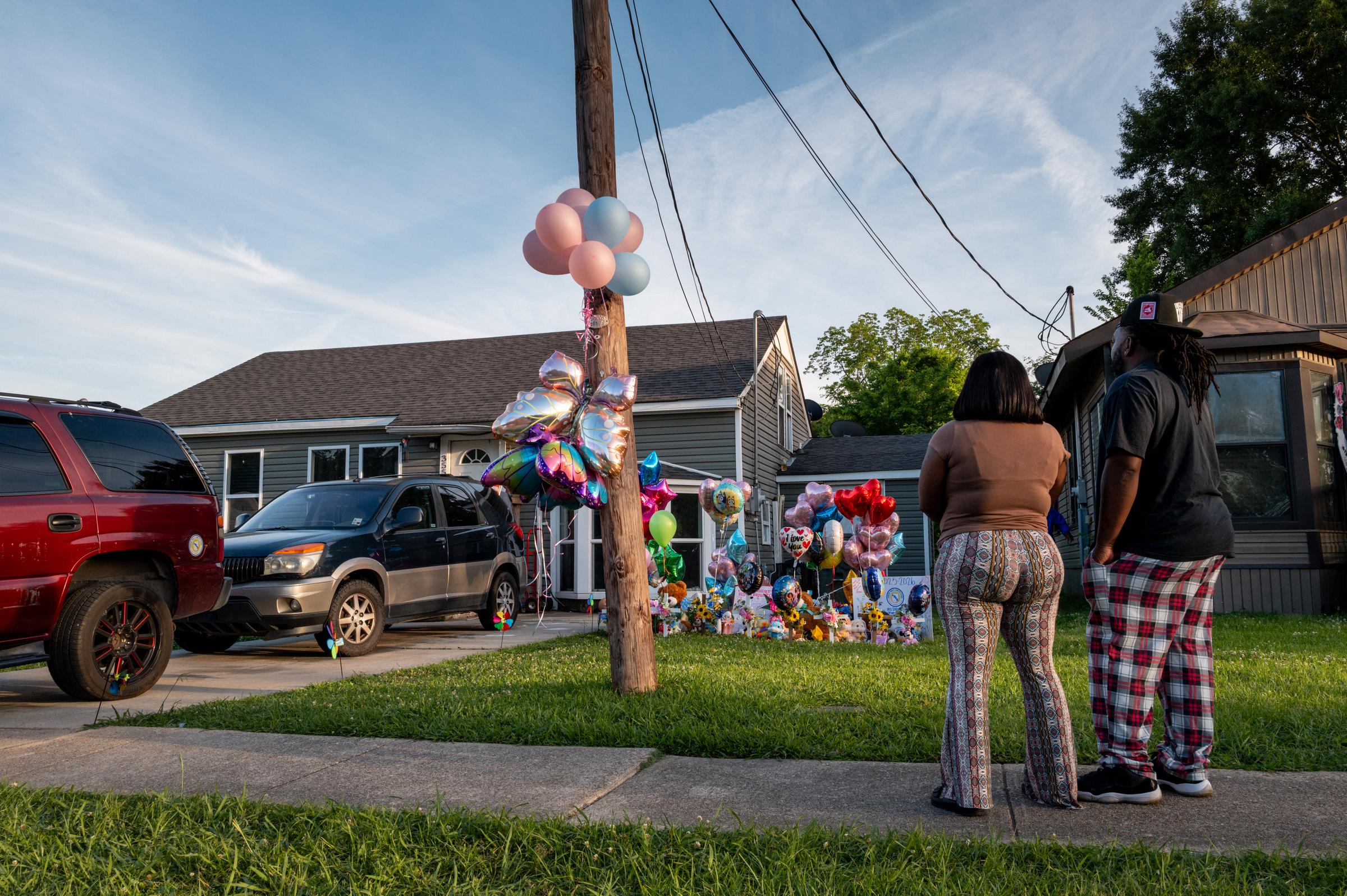 People pay tribute outside a home following the deadly shooting in Shreveport, Louisiana | Source: Getty Images