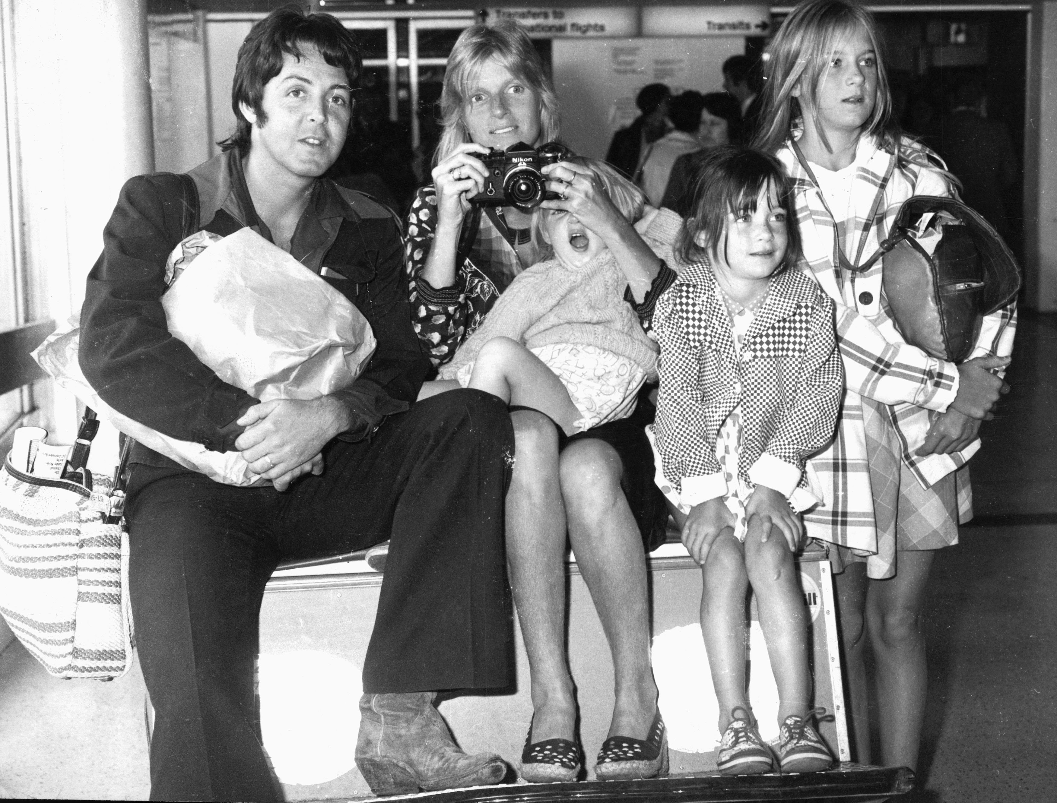 Paul and Linda McCartney with their children James, Mary and Stella at London Airport in September 1974 | Source: Getty Images 