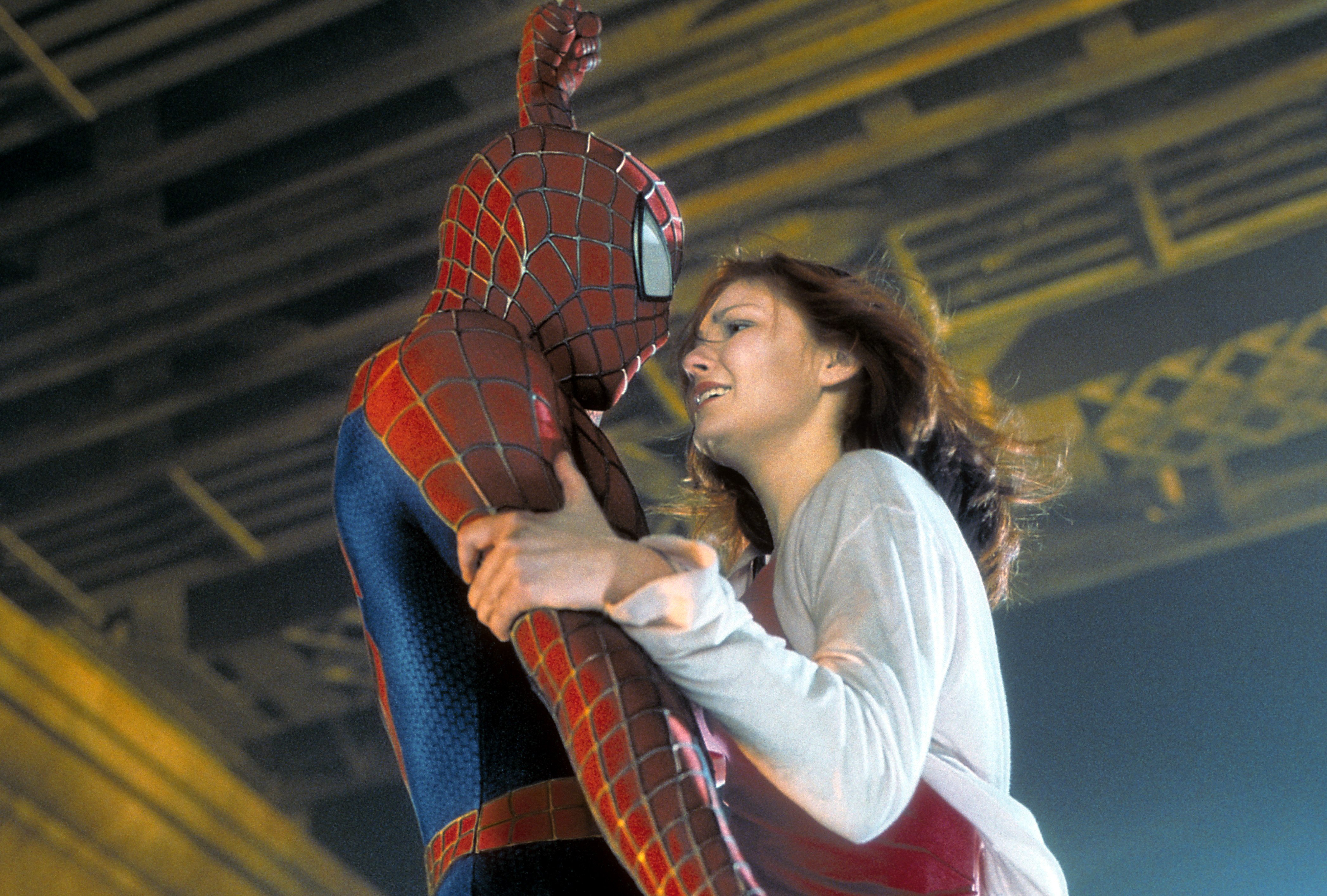 Tobey Maguire playing Spider-Man shares a scene with Kirsten Dunst from the film "Spiderman" in 2002. | Source: Getty Images