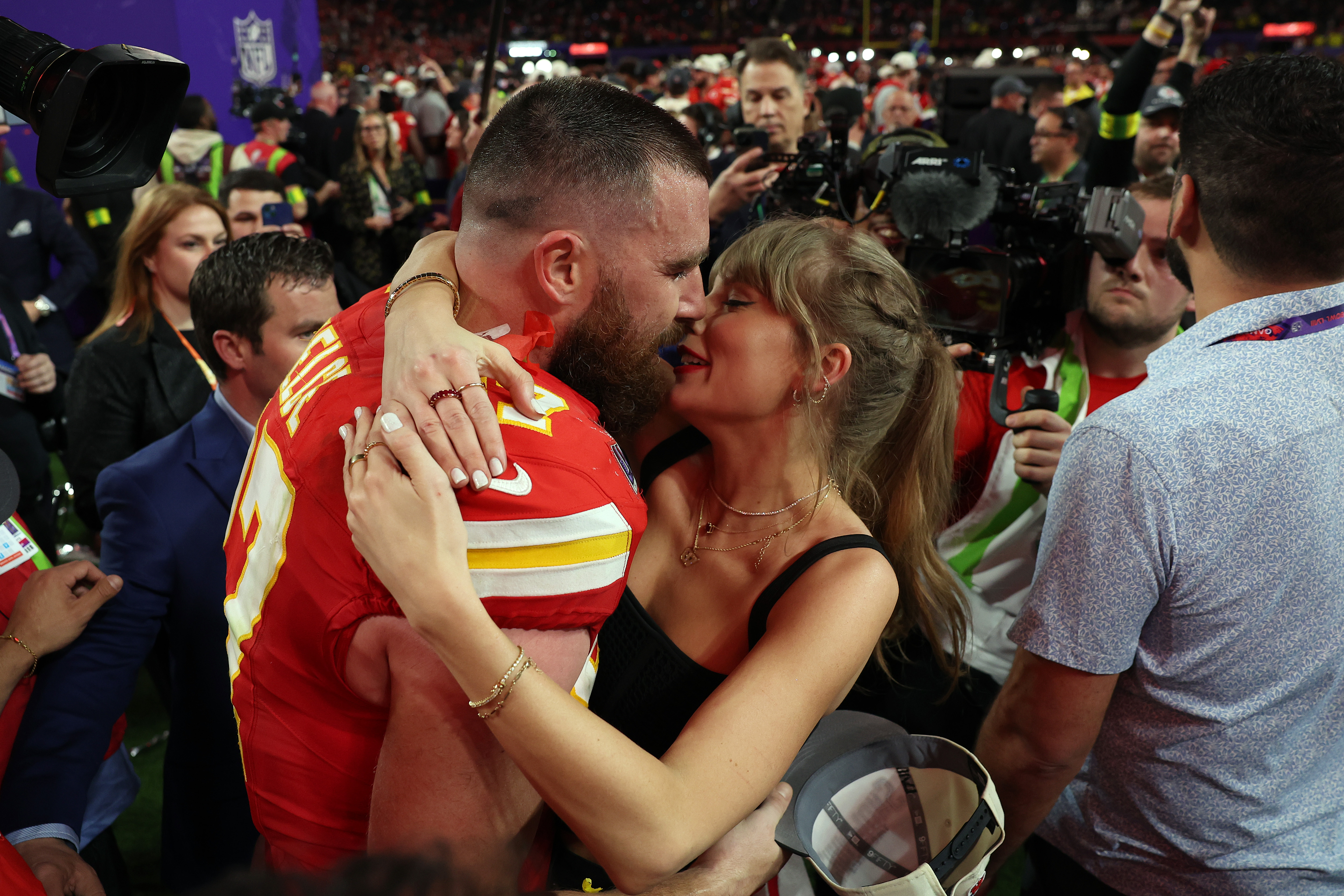 Taylor Swift and Travis Kelce embrace after a Kansas Chiefs win on February 11, 2024 in Las Vegas, Nevada | Source: Getty Images
