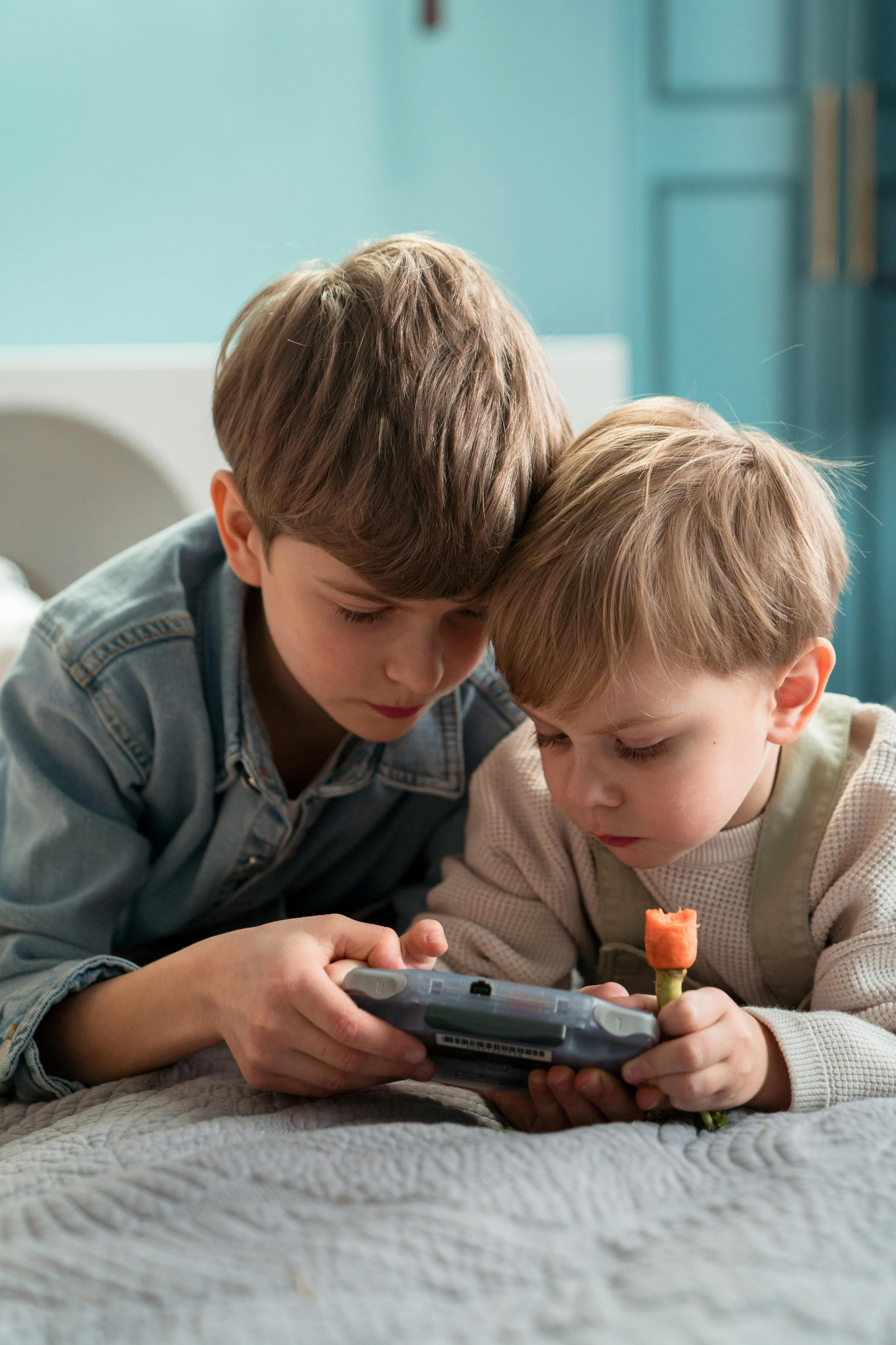 Two boys playing together | Source: Pexels