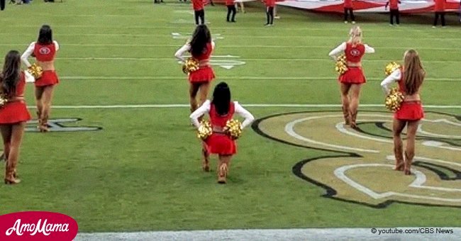 First cheerleader to kneel down during the national anthem to stand up for justice