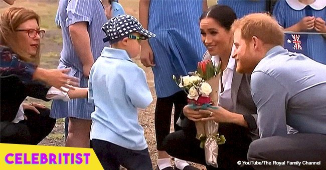 Little boy gets hugs from the royal family after stroking Prince Harry's beard