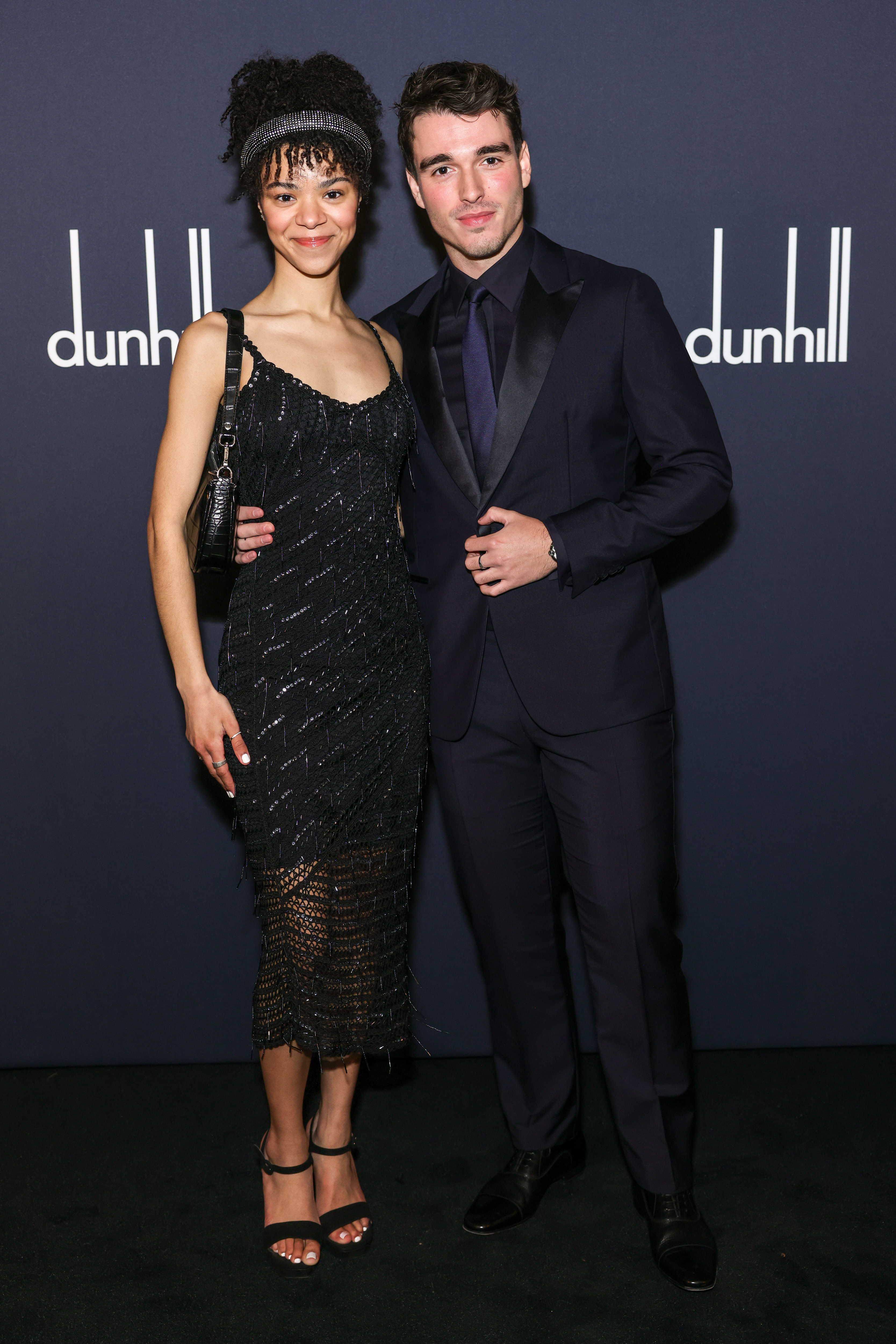 India Ria Amarteifio and Corey Mylchreest at the Dunhill & BSBP pre-BAFTA filmmakers dinner & party on February 15, 2023, in London | Source: Getty Images