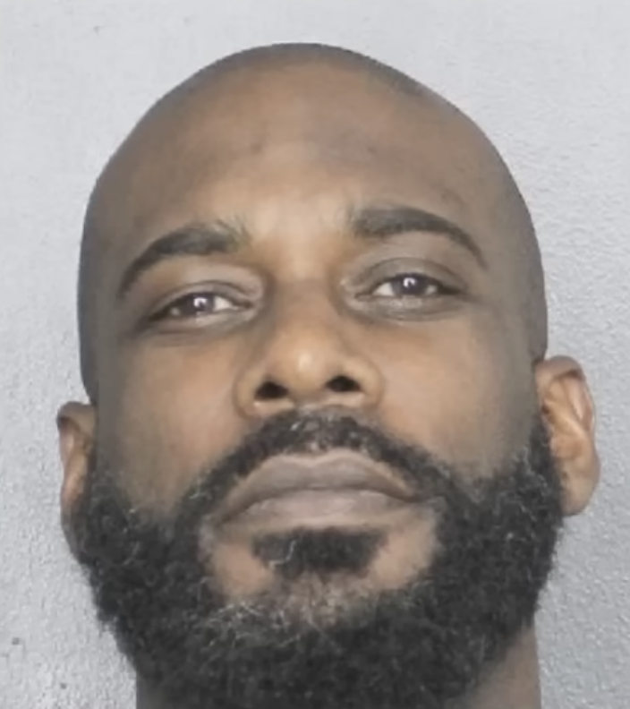 A close-up image shows Stephen Bowen with a neutral expression against a plain background, highlighting his face and beard. | Source: YouTube/WPLG Local 10