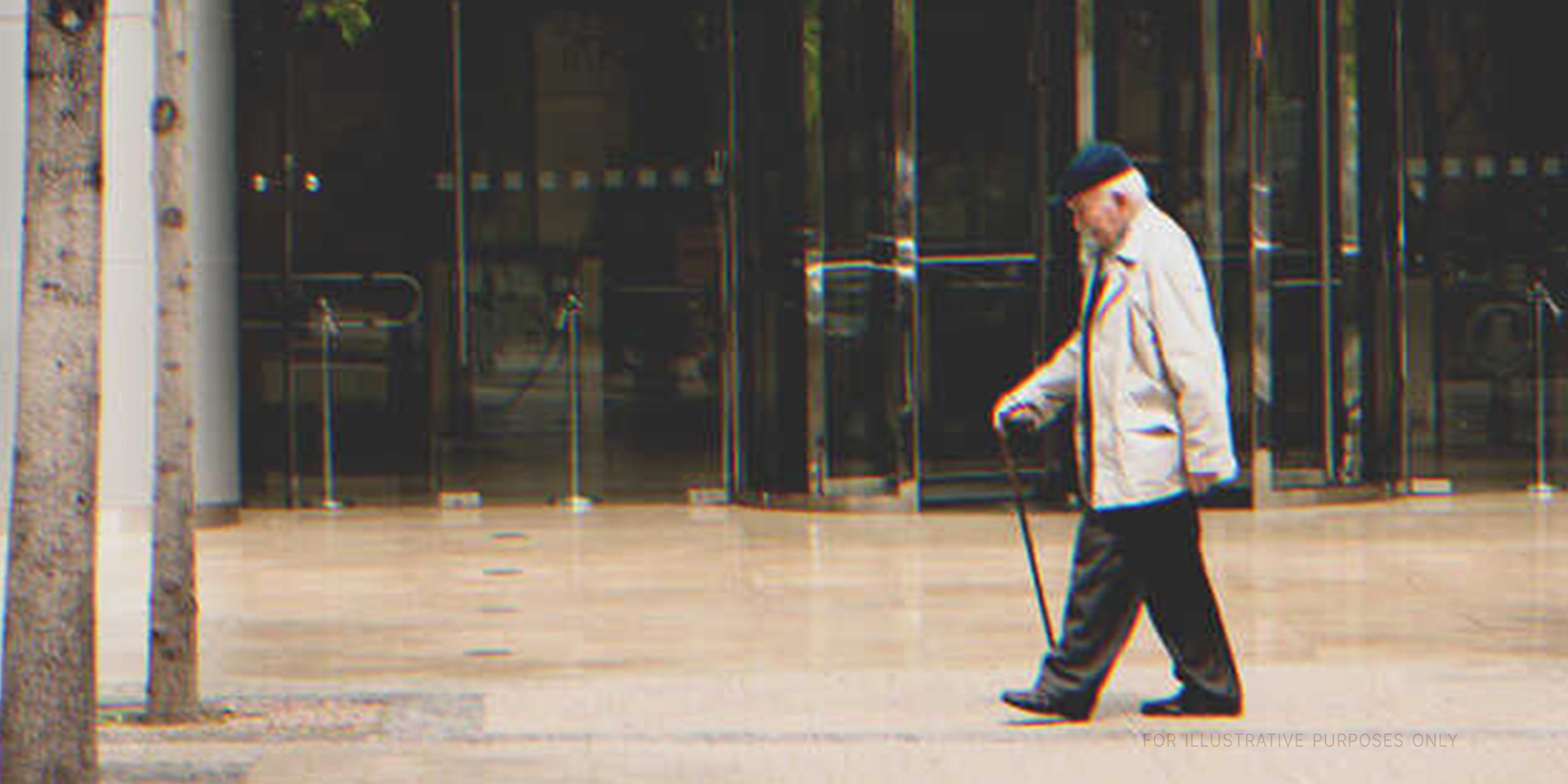 Old Man Walking With A Stick | Source: Shutterstock
